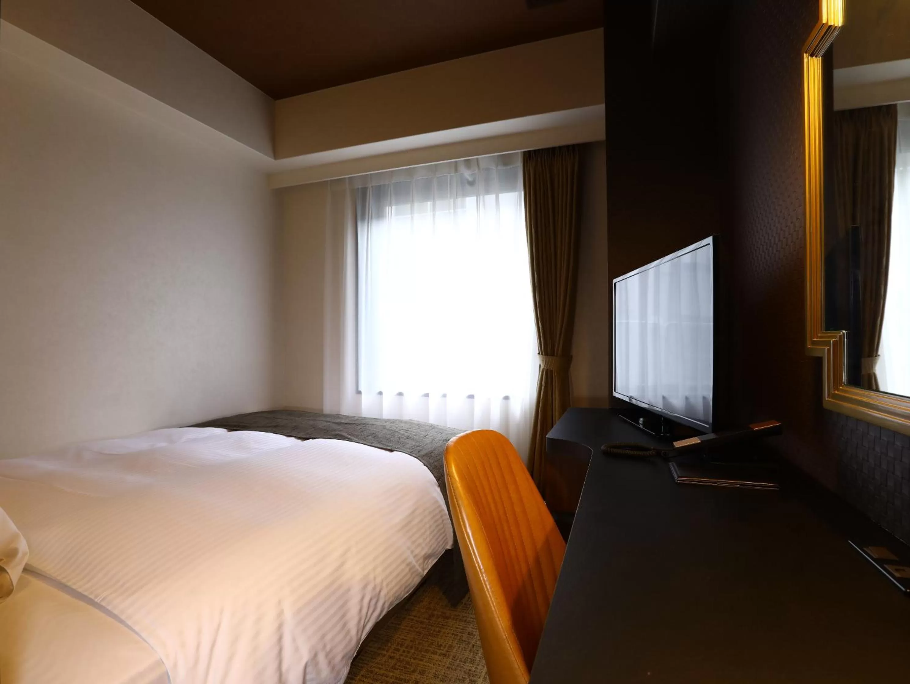 Bed in Hotel Wing International Select Osaka Umeda