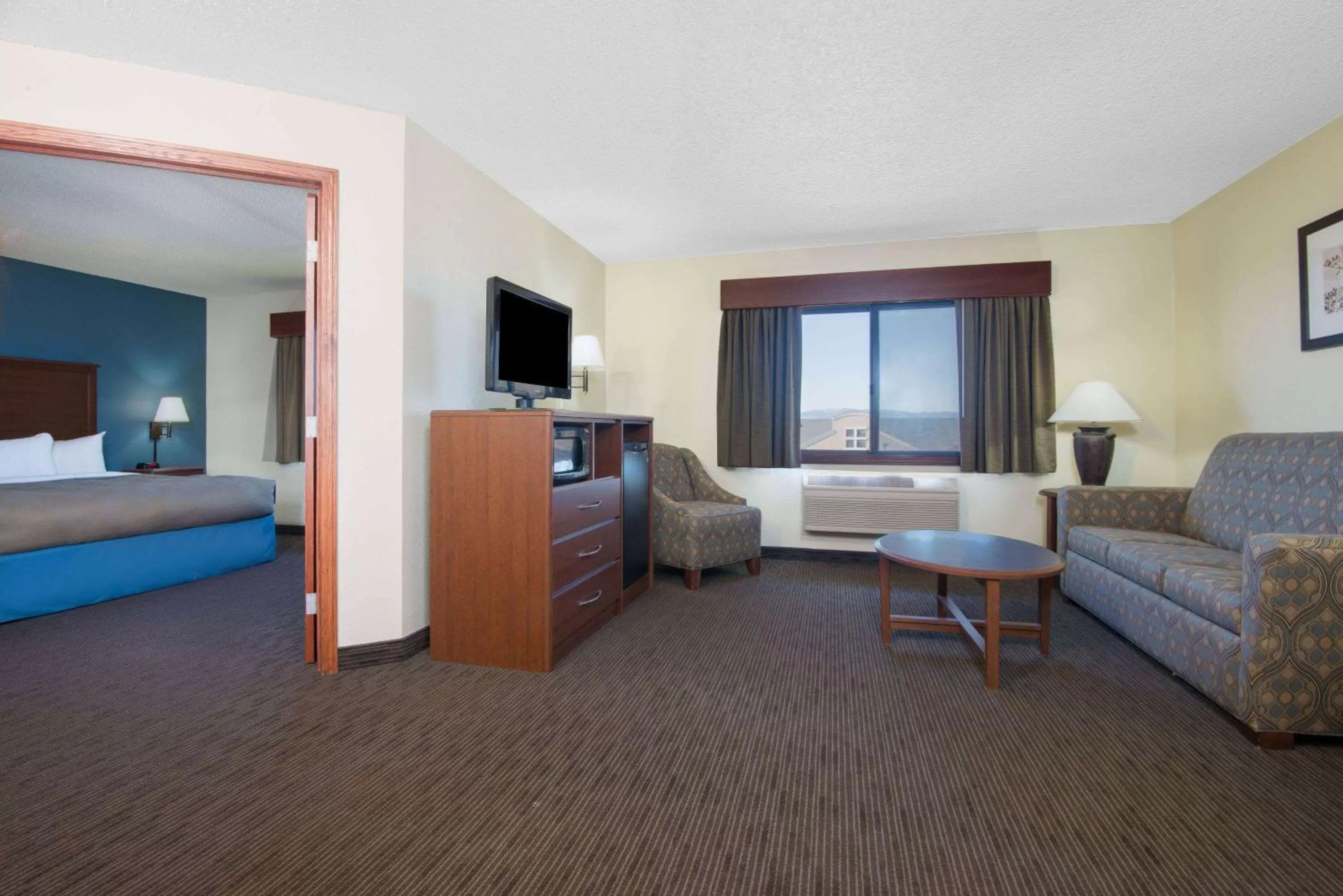 Bed in AmericInn by Wyndham Windsor Ft. Collins