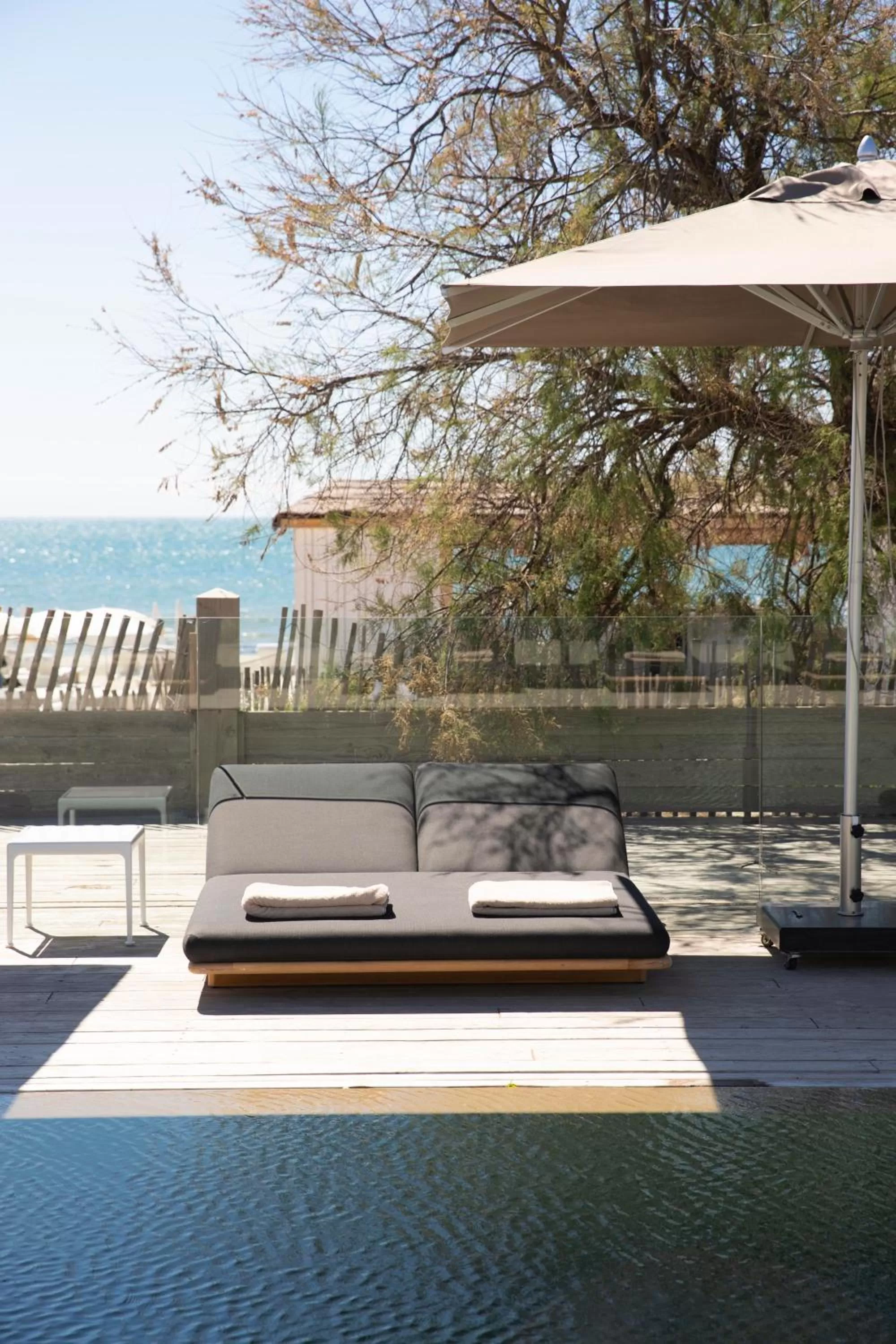 Swimming pool in Hôtel Plage Palace & Spa