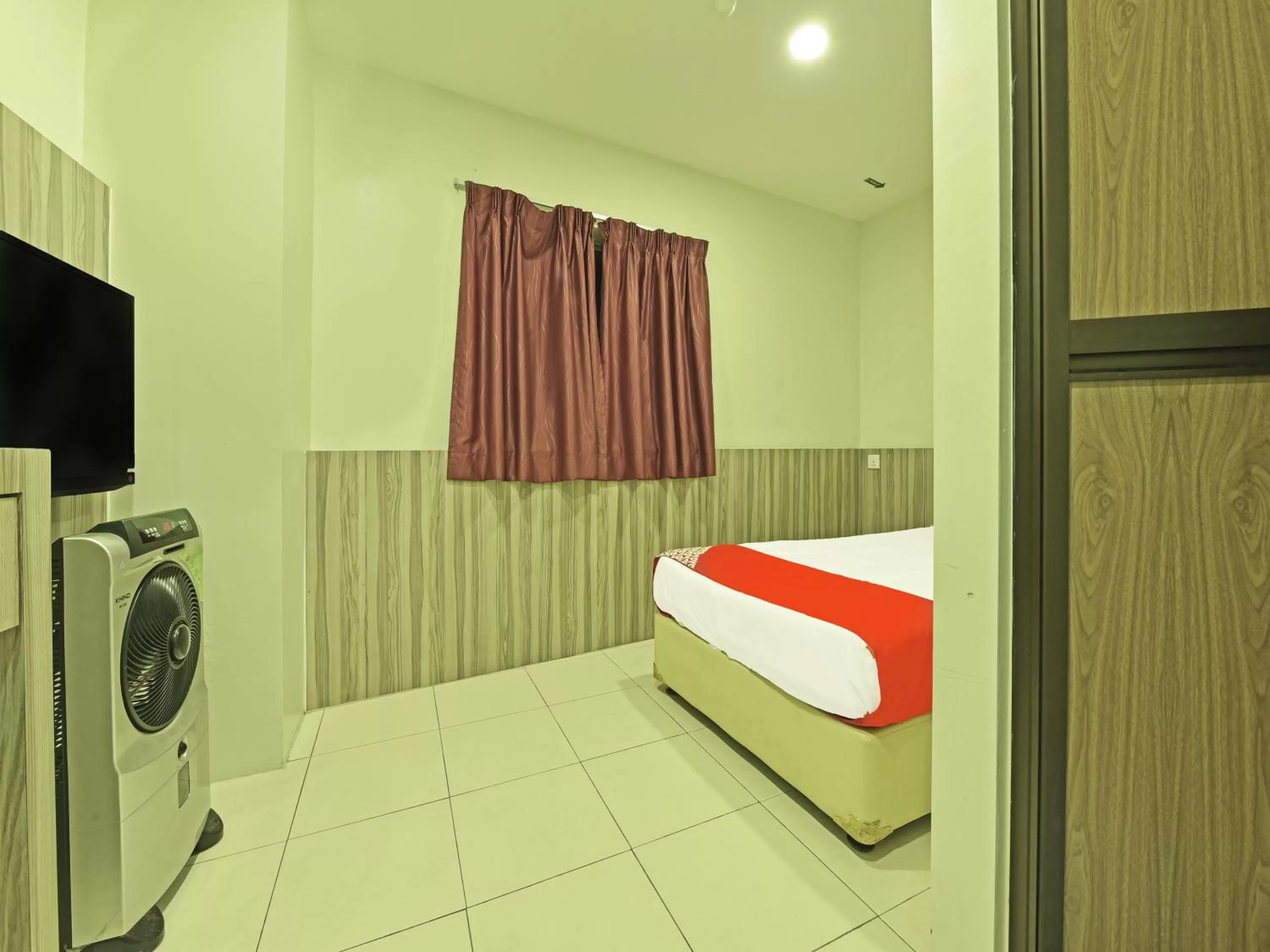 TV/Entertainment Center in Super OYO Capital O 90545 Ho Hotel