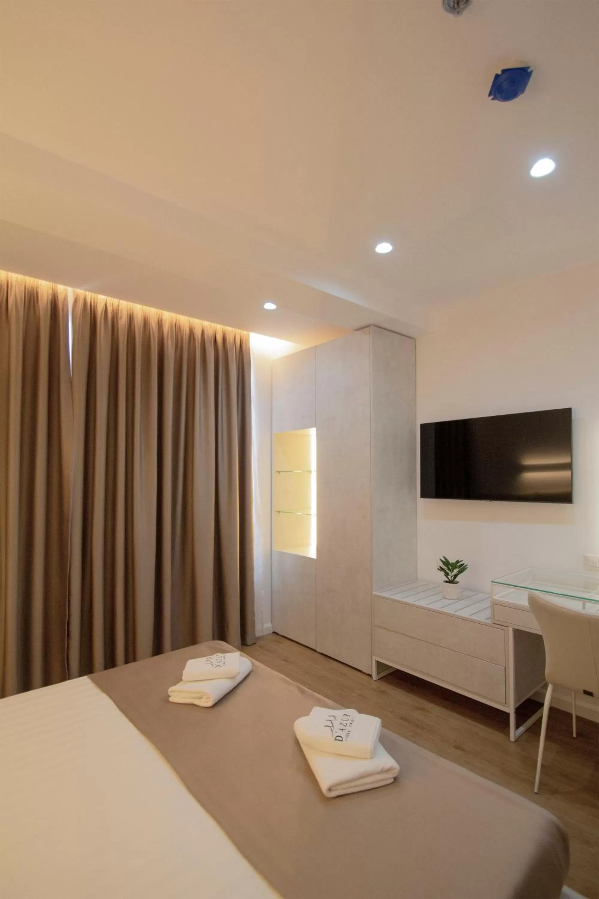 Bed in Dazur Coast Resort