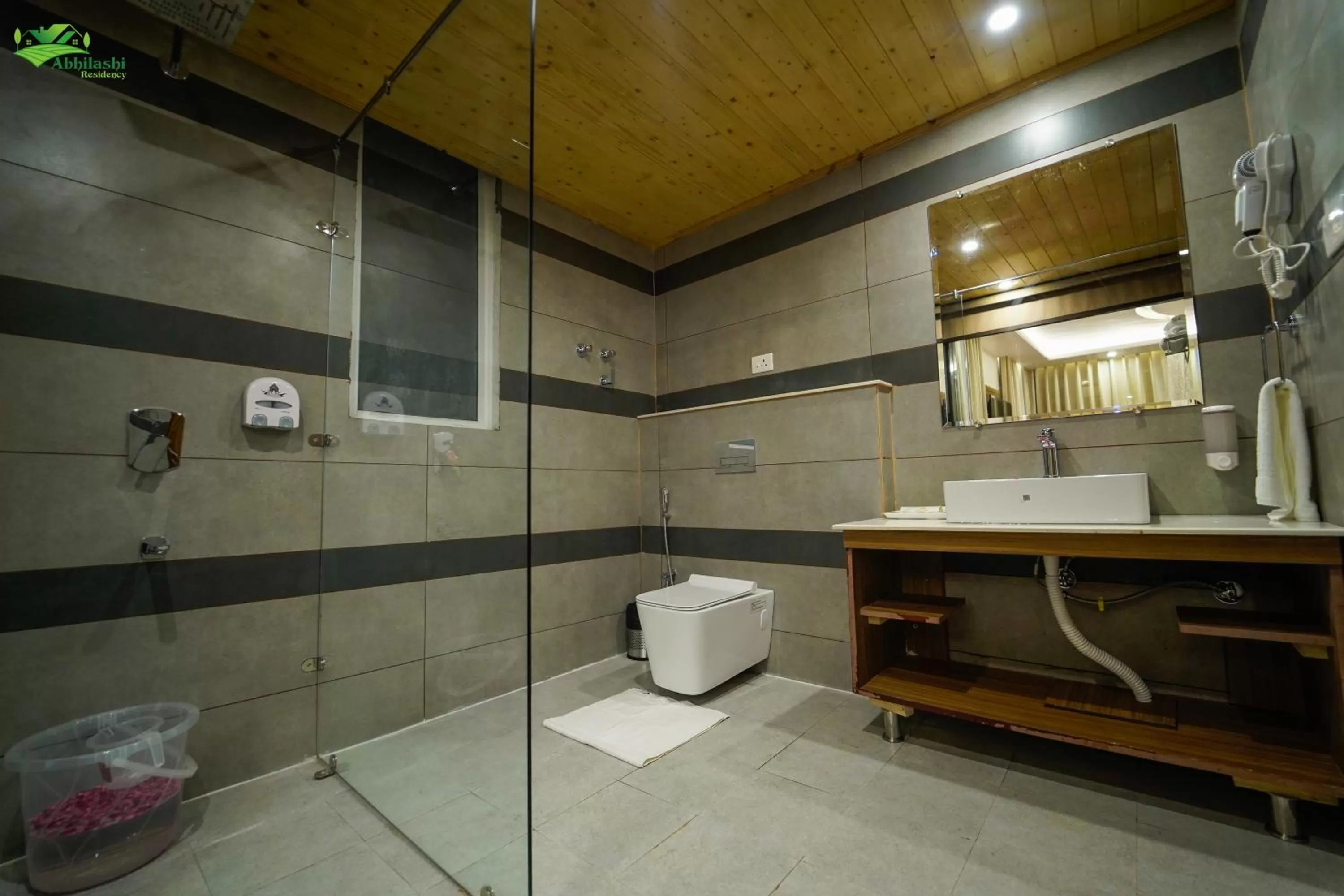 Bathroom in Abhilashi Residency & Spa - Centrally Heated & Air Cooled