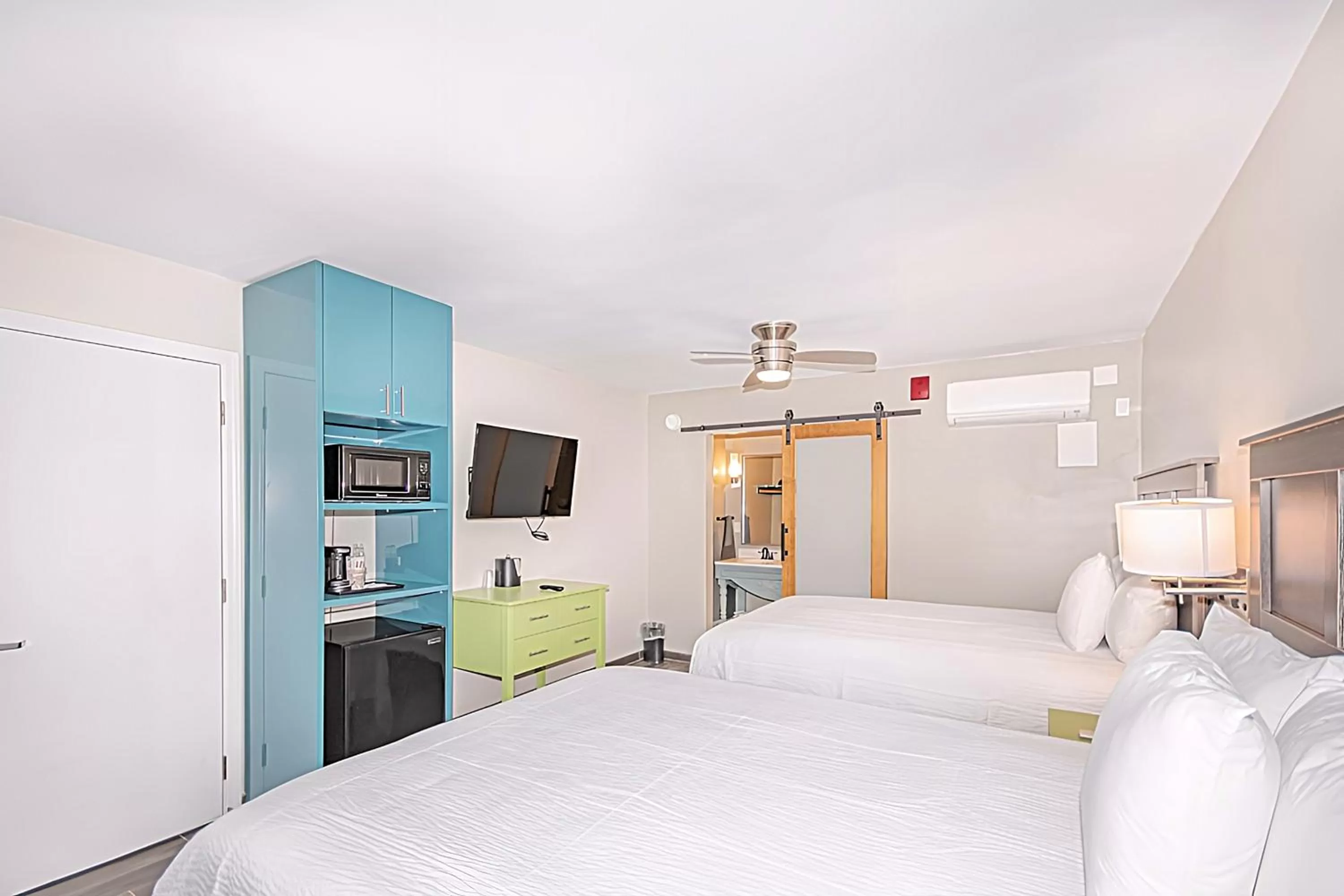 Bed in Seven Hills Suites Tallahassee