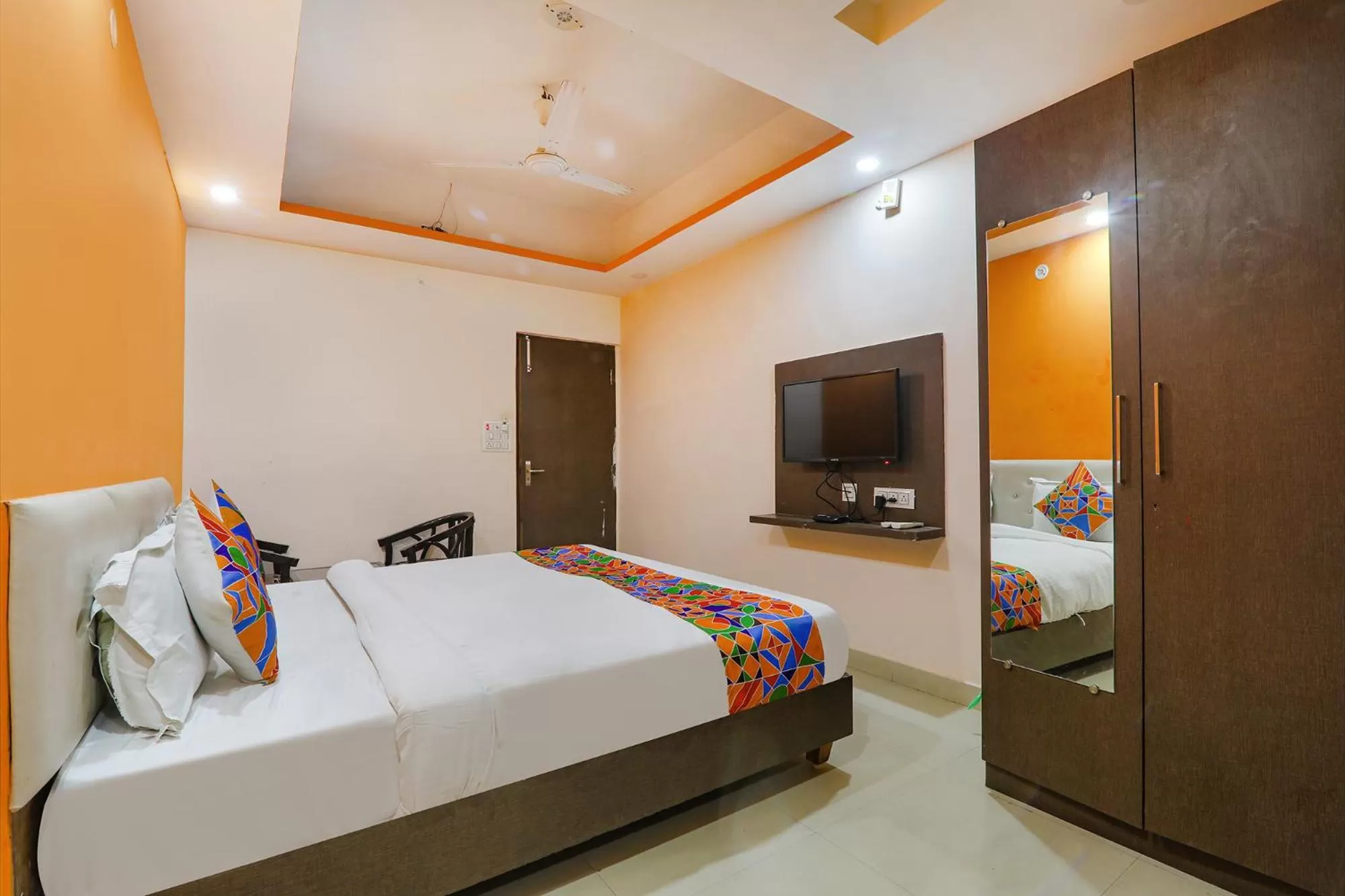 Bed in FabHotel Vinayaka