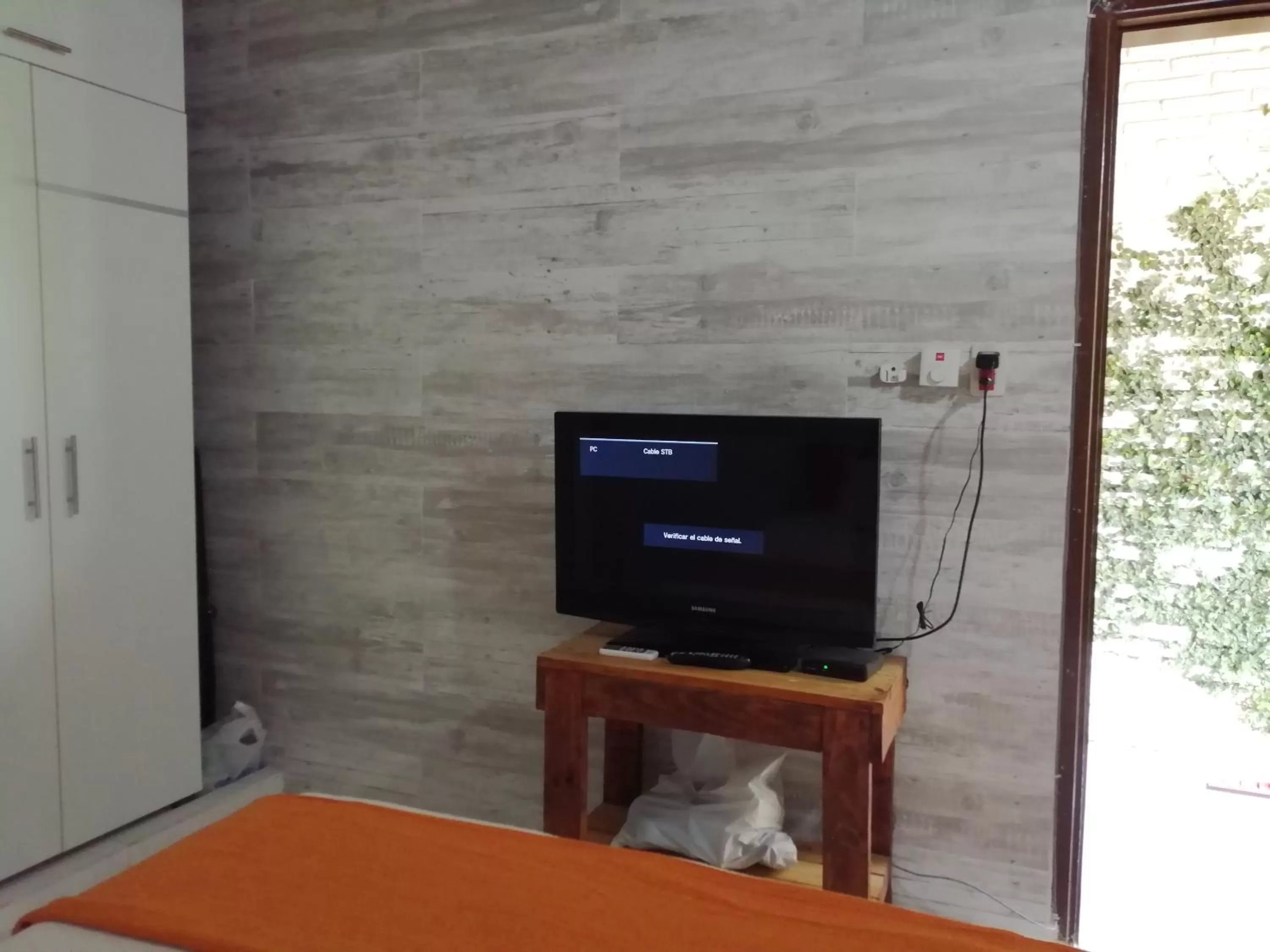 TV and multimedia, TV/Entertainment Center in Granados B&B