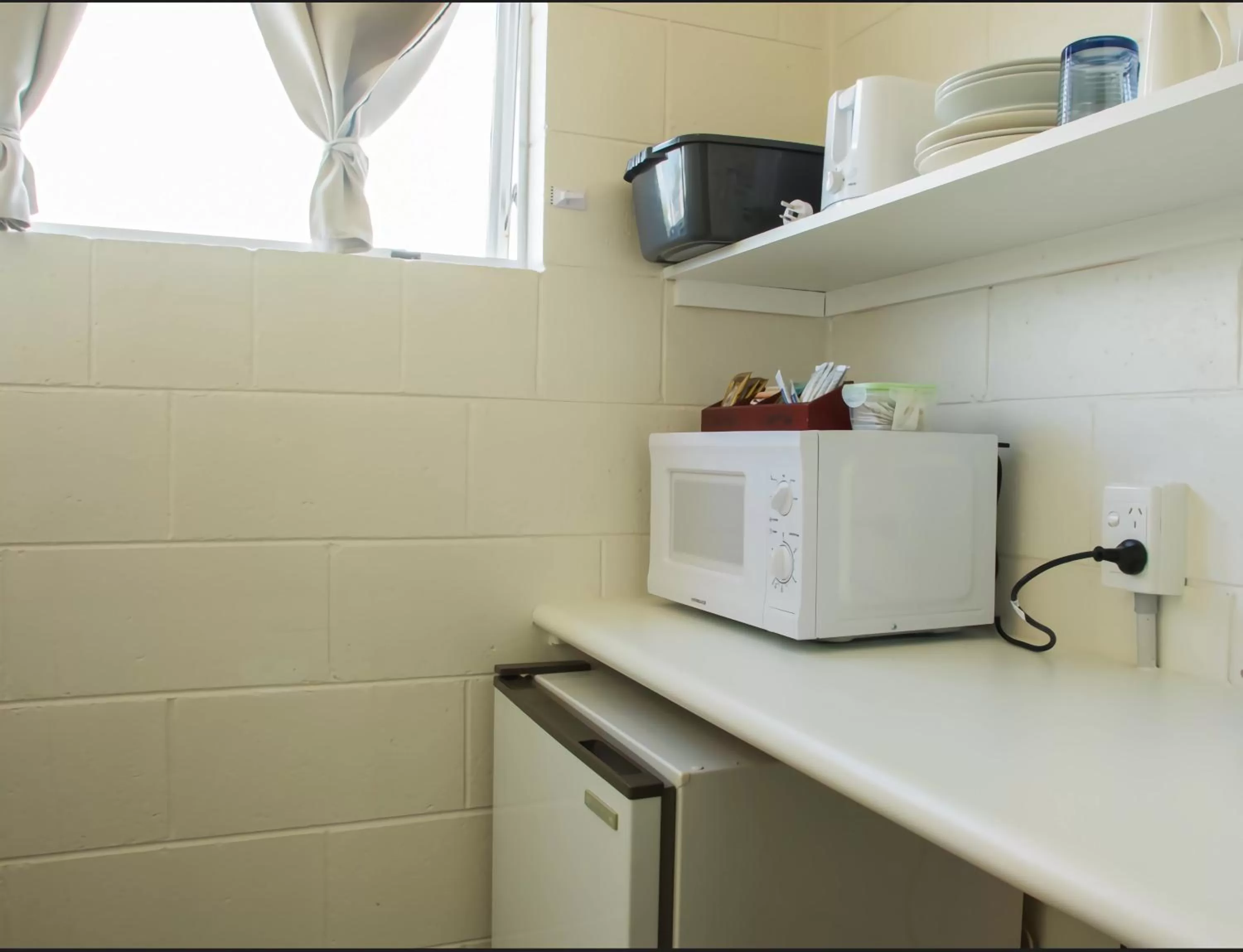 Kitchen or kitchenette in Alpha Motor Inn