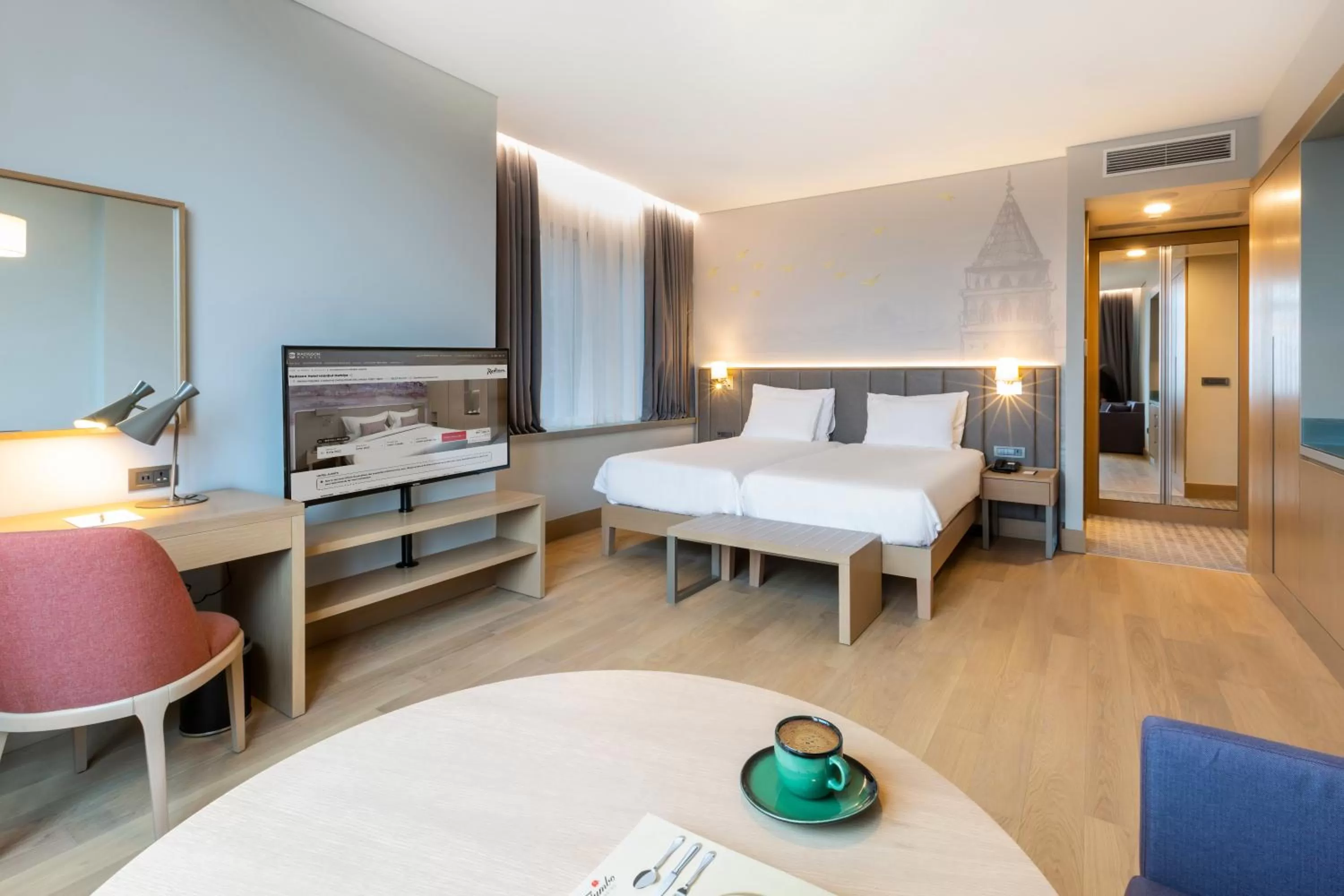 Photo of the whole room, Bed in Radisson Hotel Istanbul Harbiye