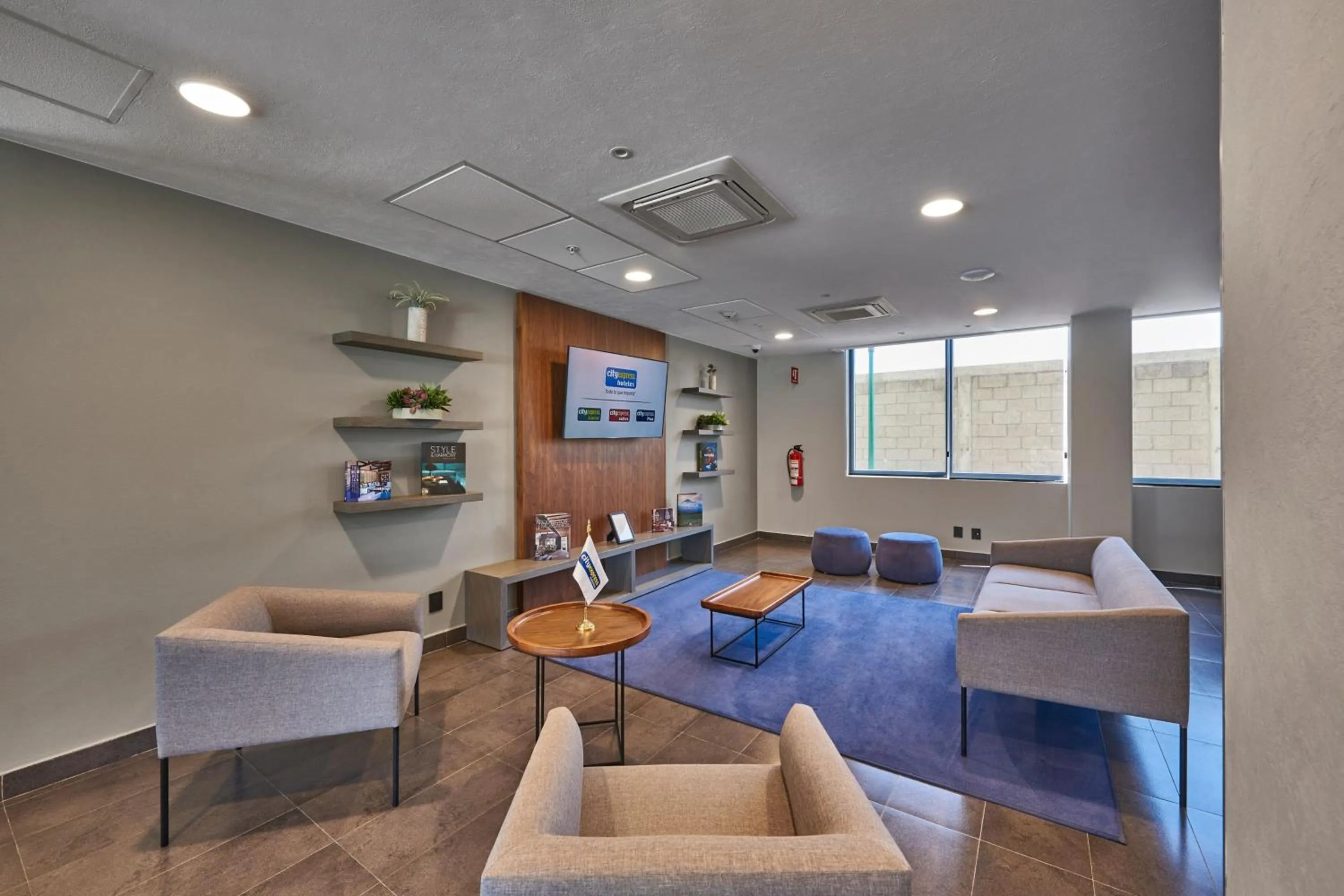 Living room in City Express by Marriott Irapuato