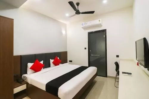 air conditioner, Bed in Hotel Nikhil Regency