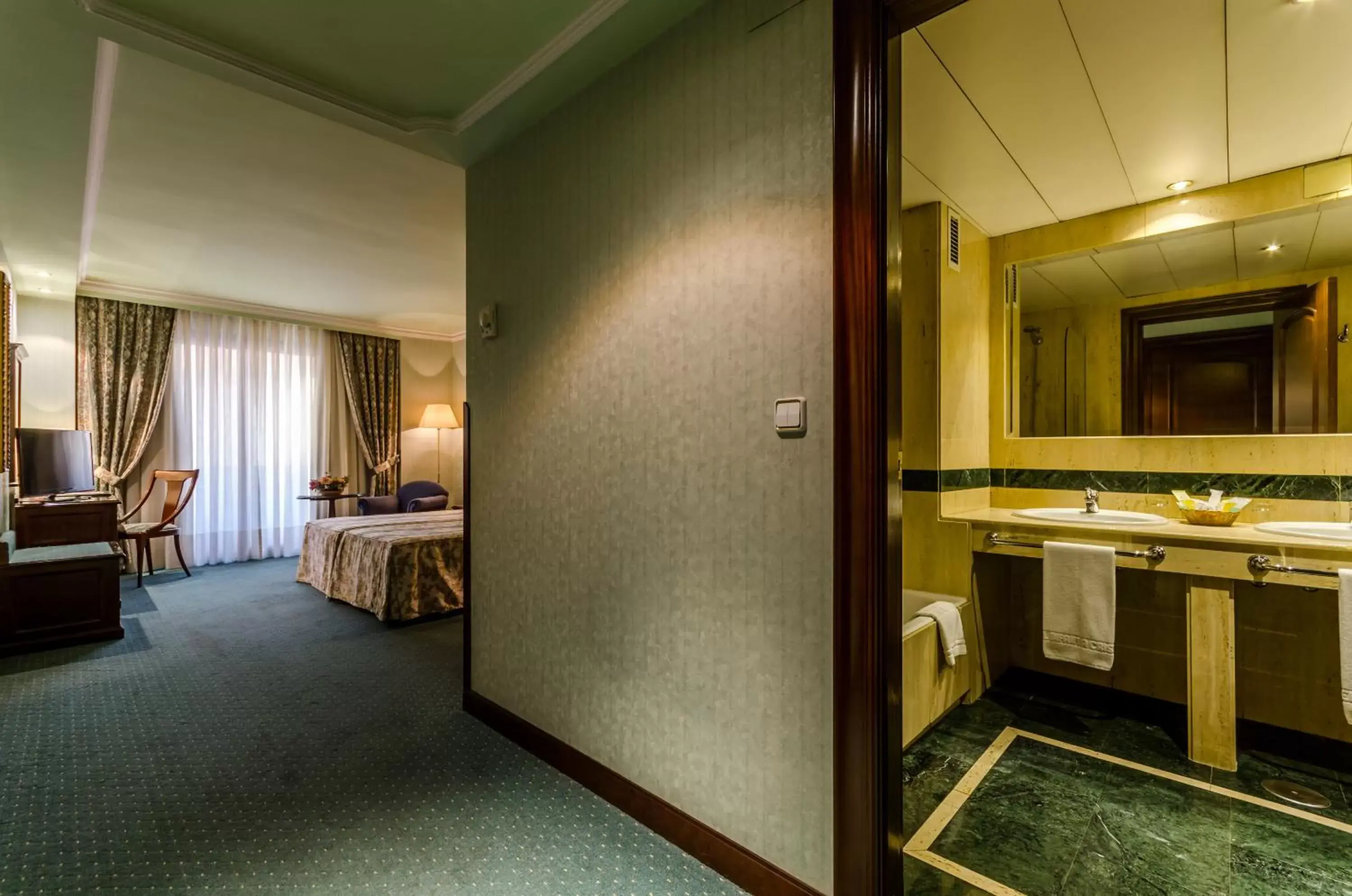 Family Room (2 Adults + 1 Child) in Infanta Cristina Family Room (2 Adults + 1 Child) in Infanta Cristina