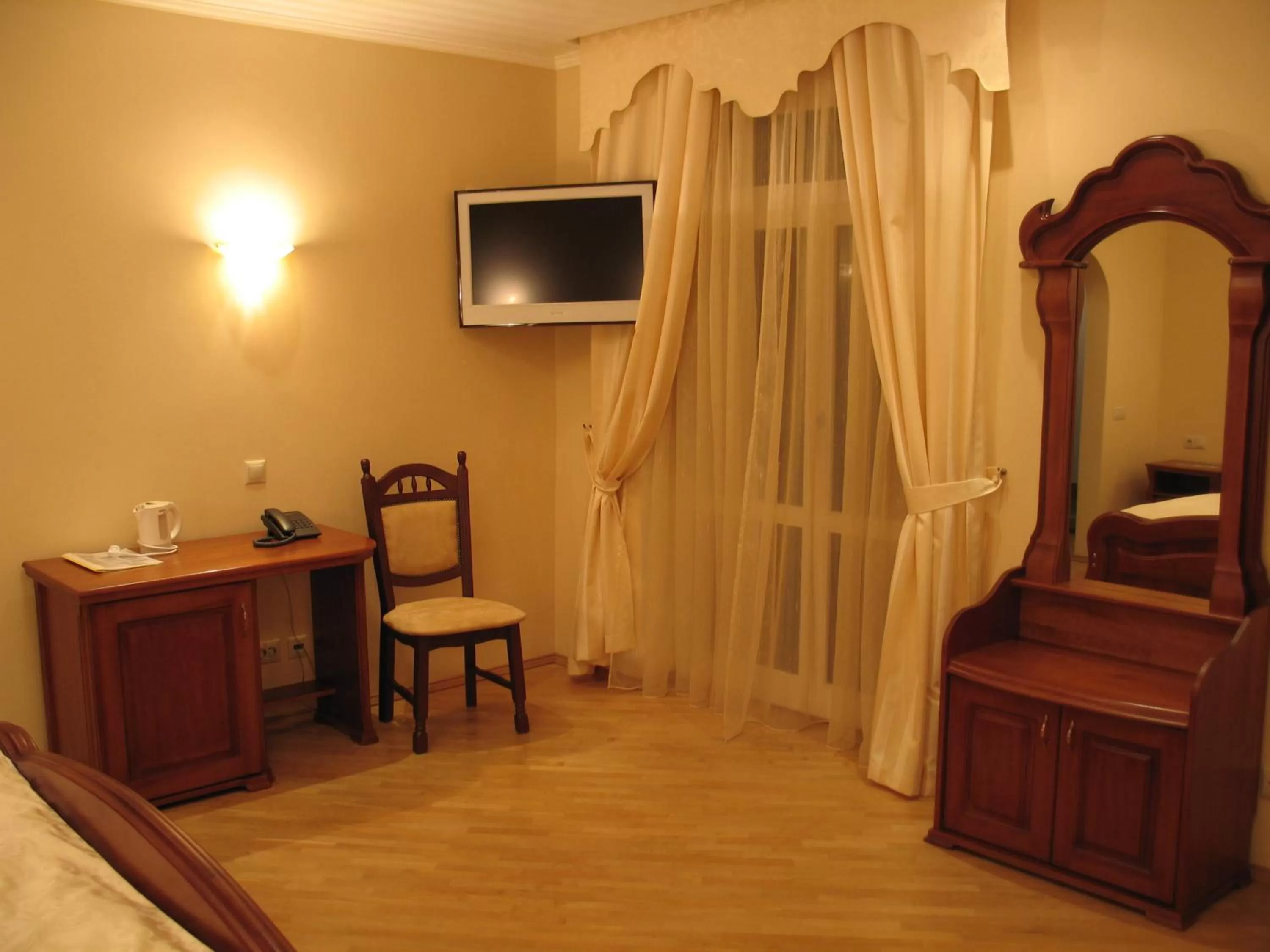 Decorative detail, TV/Entertainment Center in Red Stone