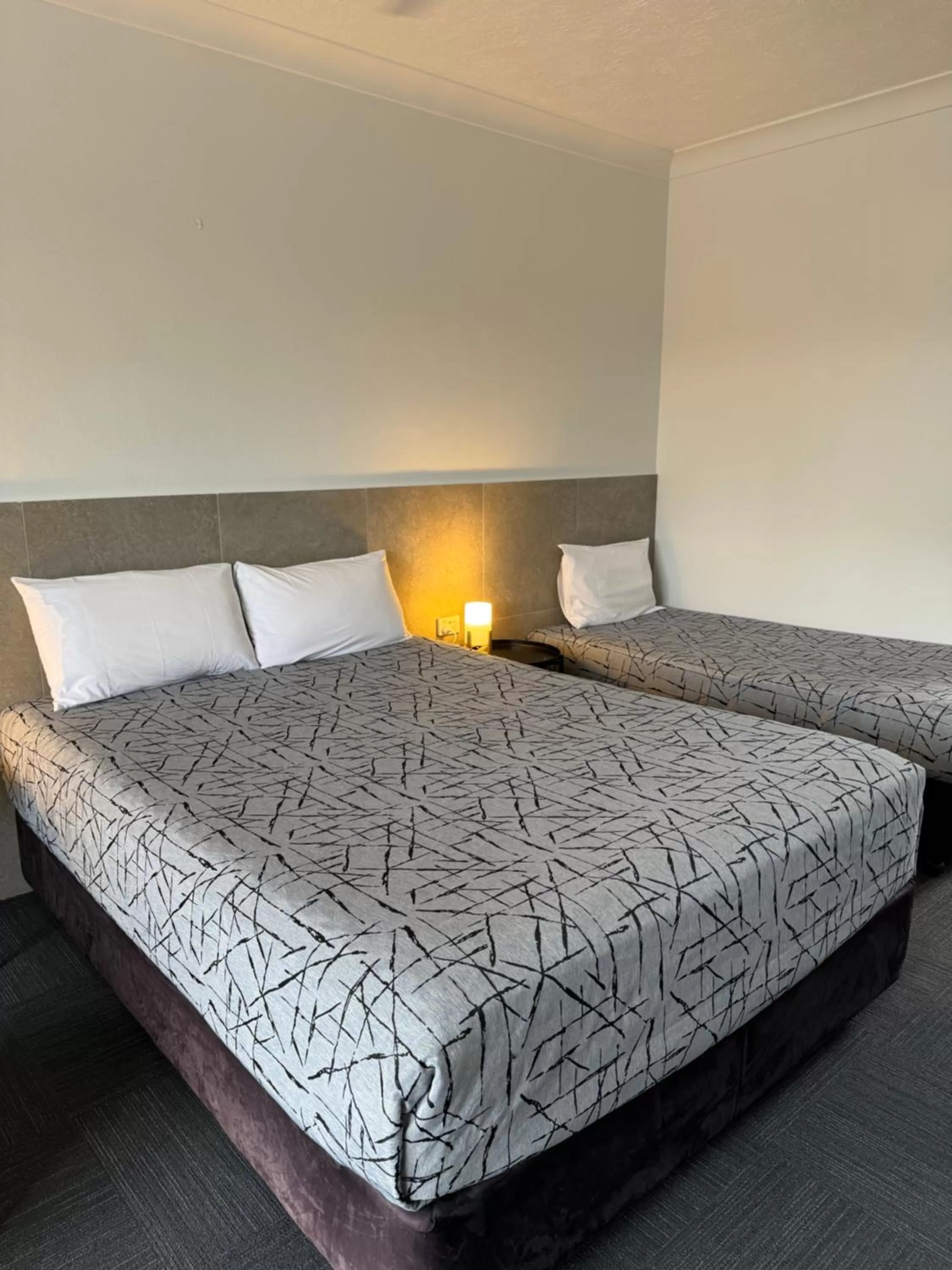 Bed in Longreach Motor Inn