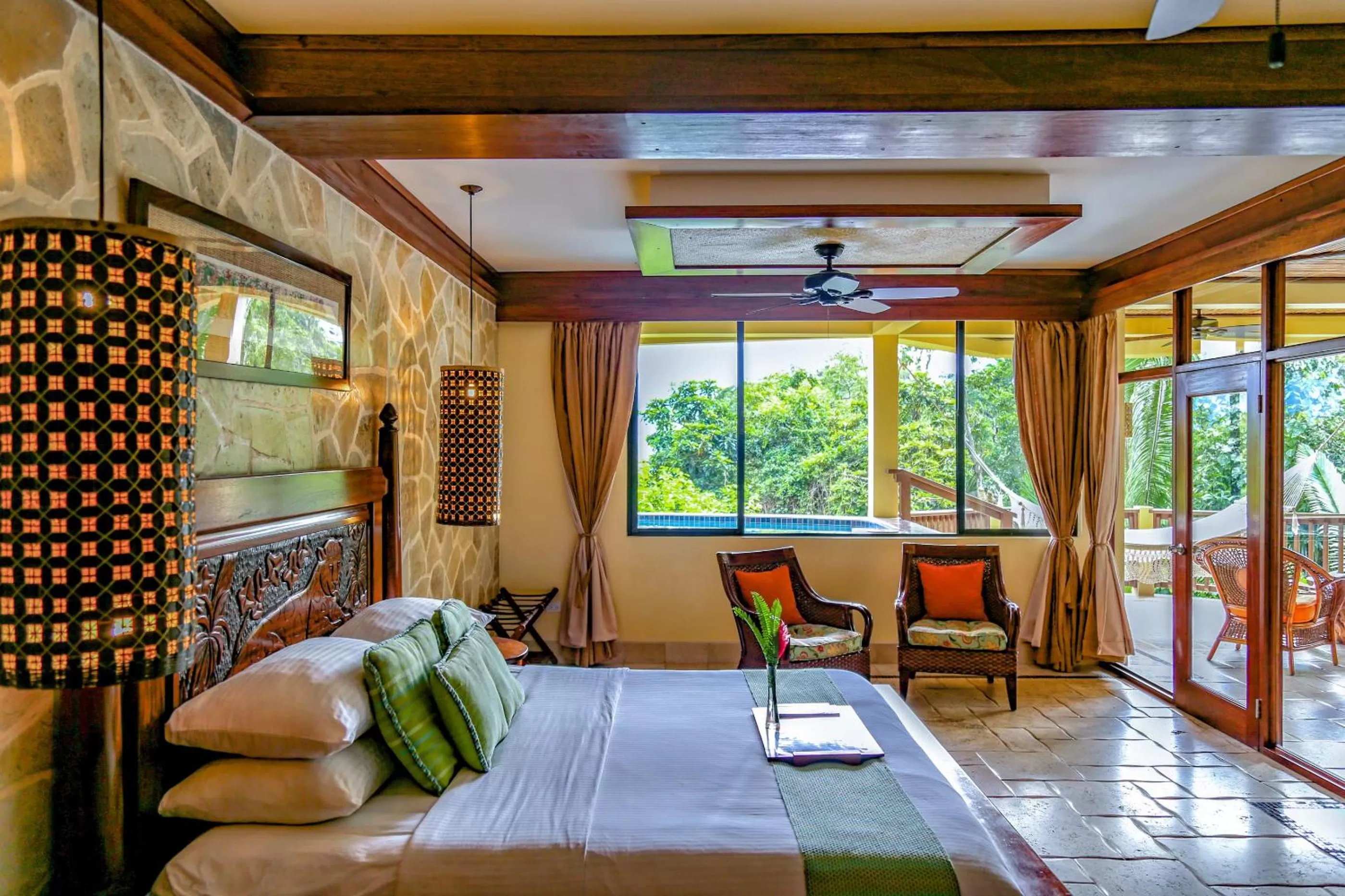 Bed in Sleeping Giant Rainforest Lodge