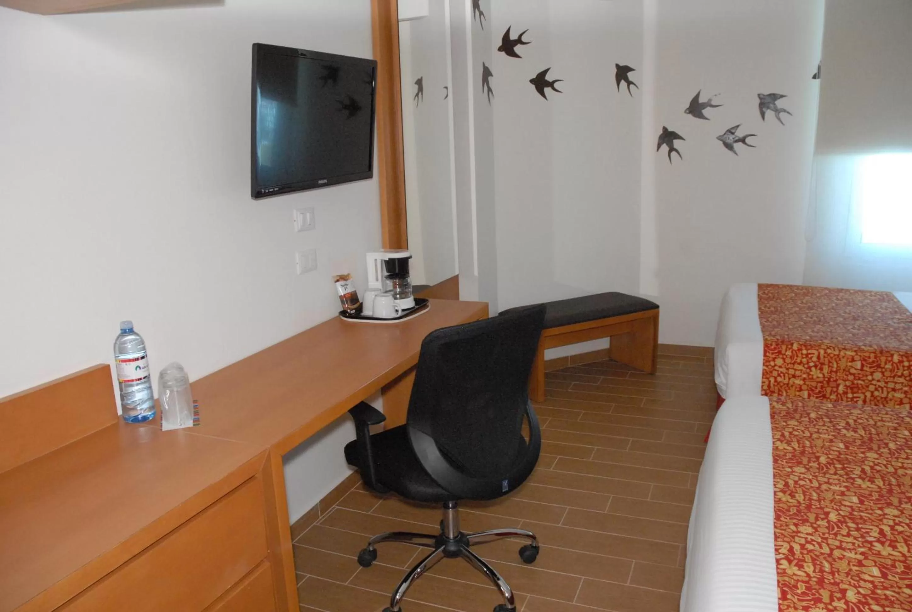 Seating area, Bed in Aranzazu Centro Historico