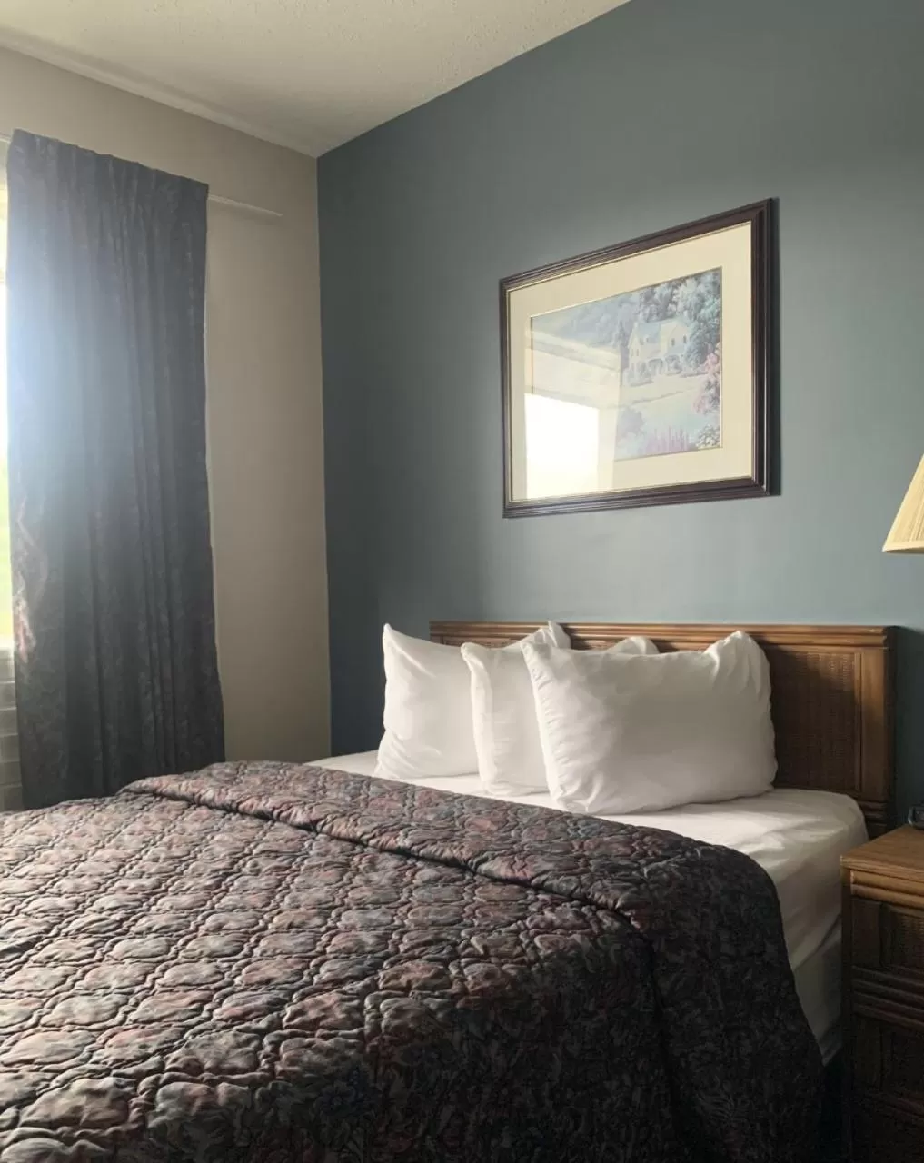Bed in Bancroft Inn & Suites