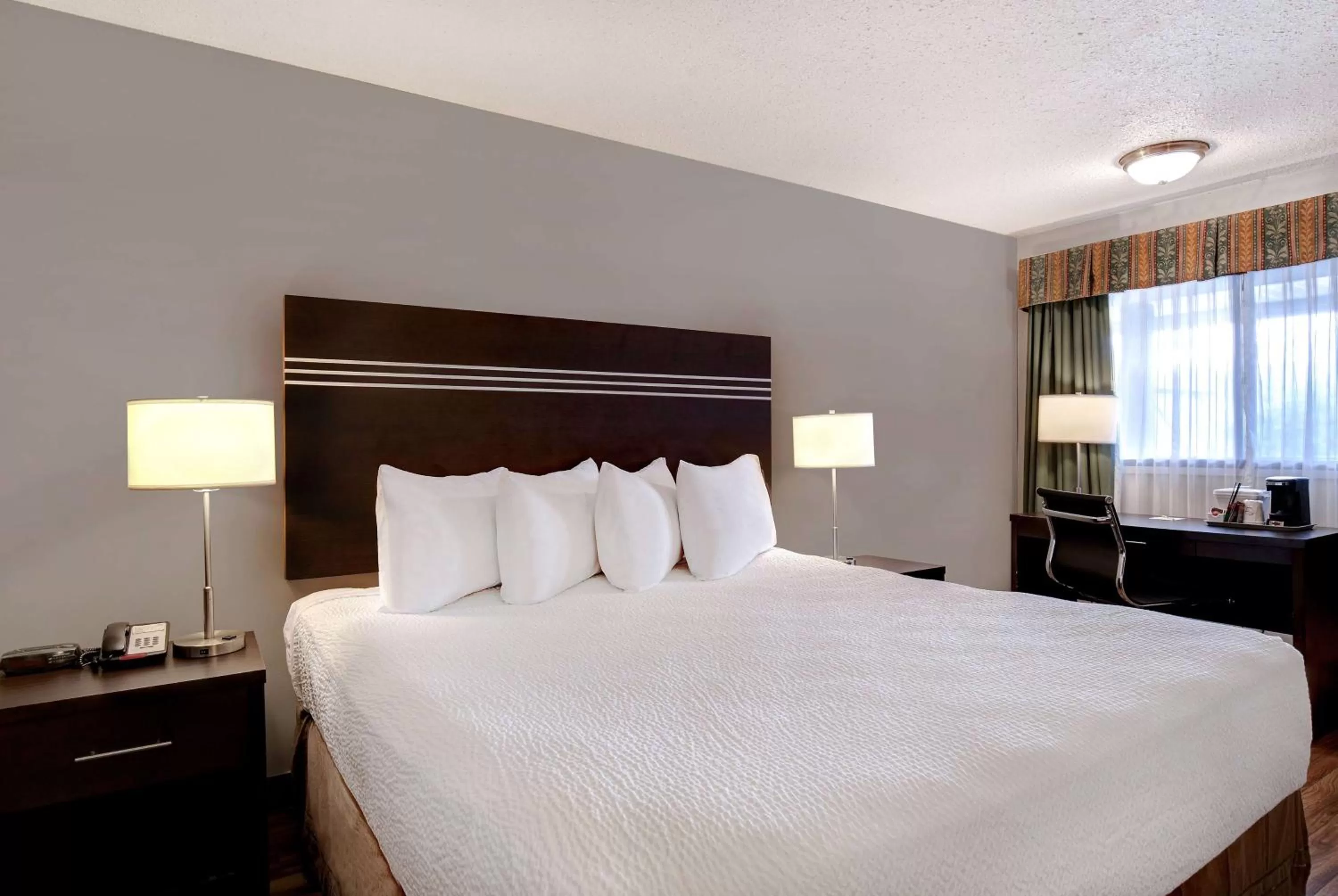 Bed in Days Inn by Wyndham Vernon