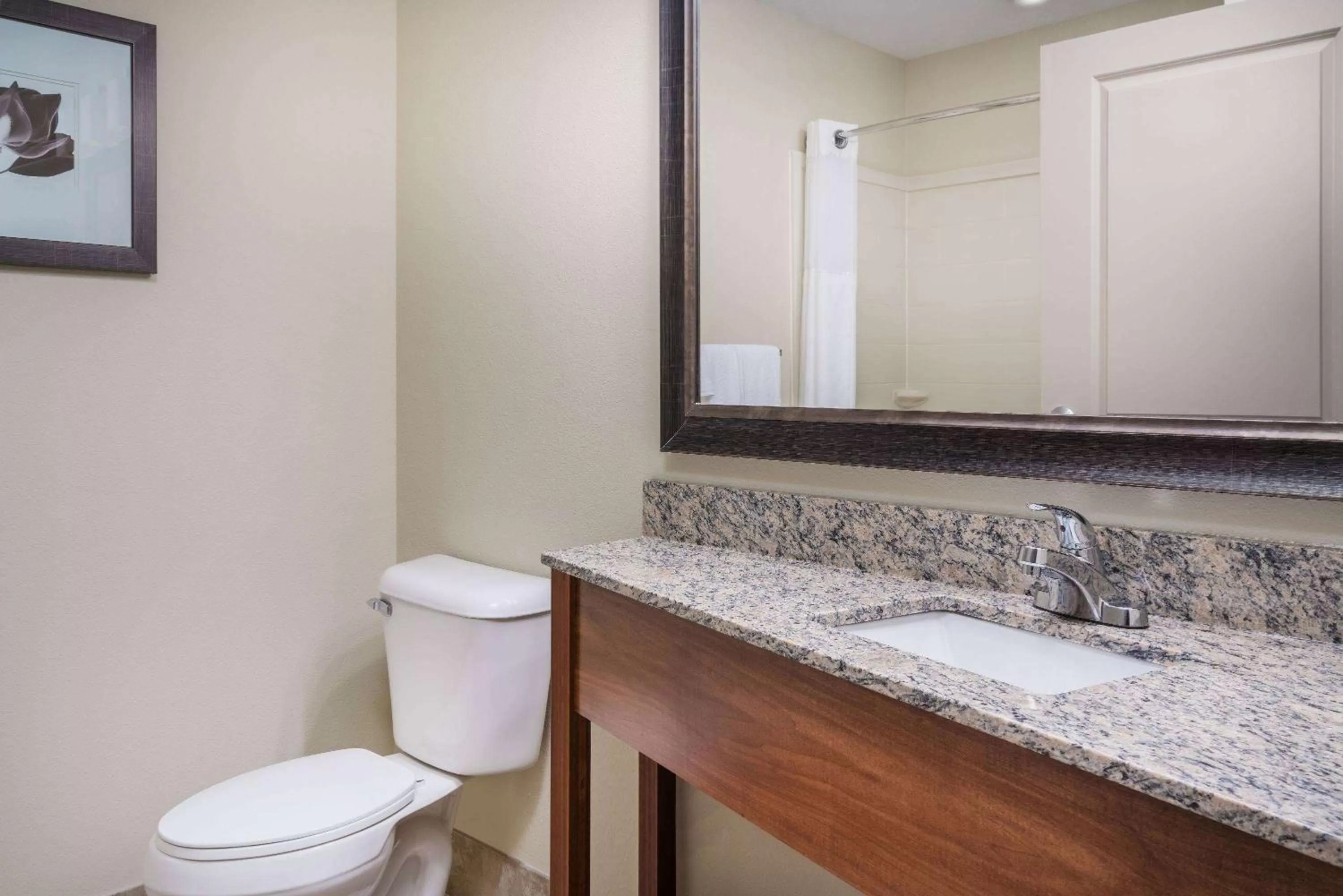 Bathroom in AmericInn by Wyndham Winona