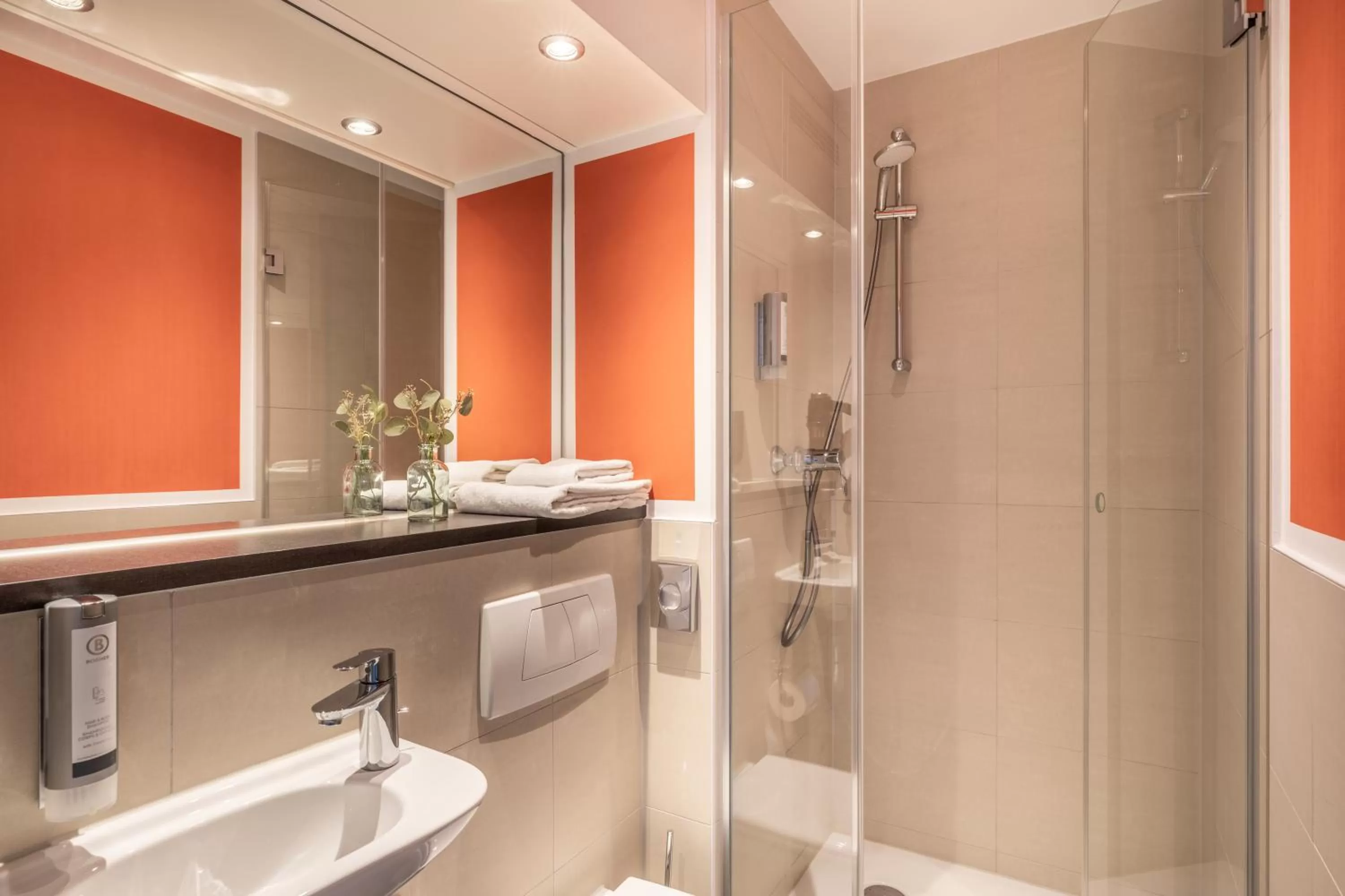 Toilet in Garner Hotel Wiesbaden City by IHG
