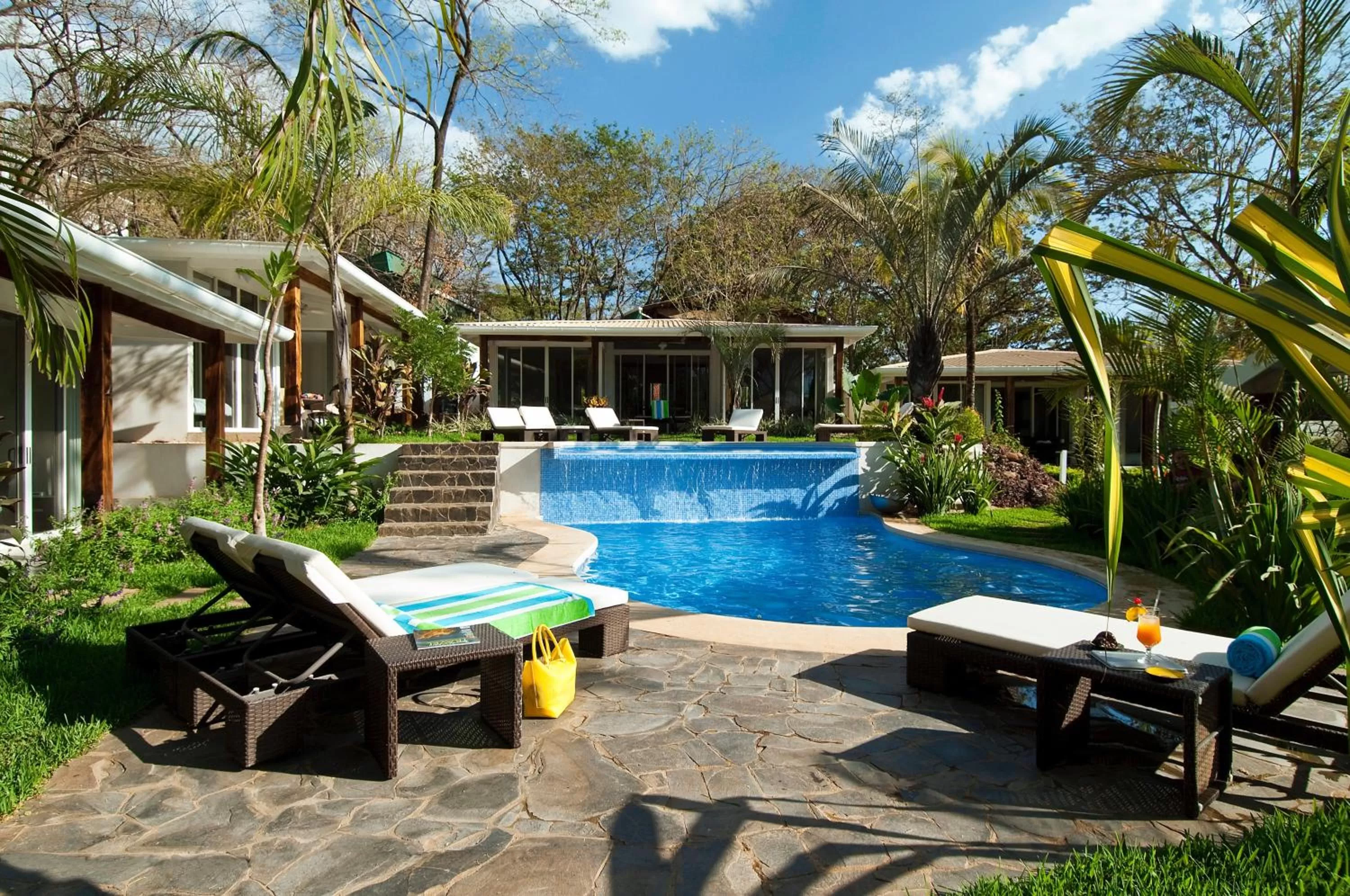 Garden, Swimming Pool in The Breeze Hotel & Villas