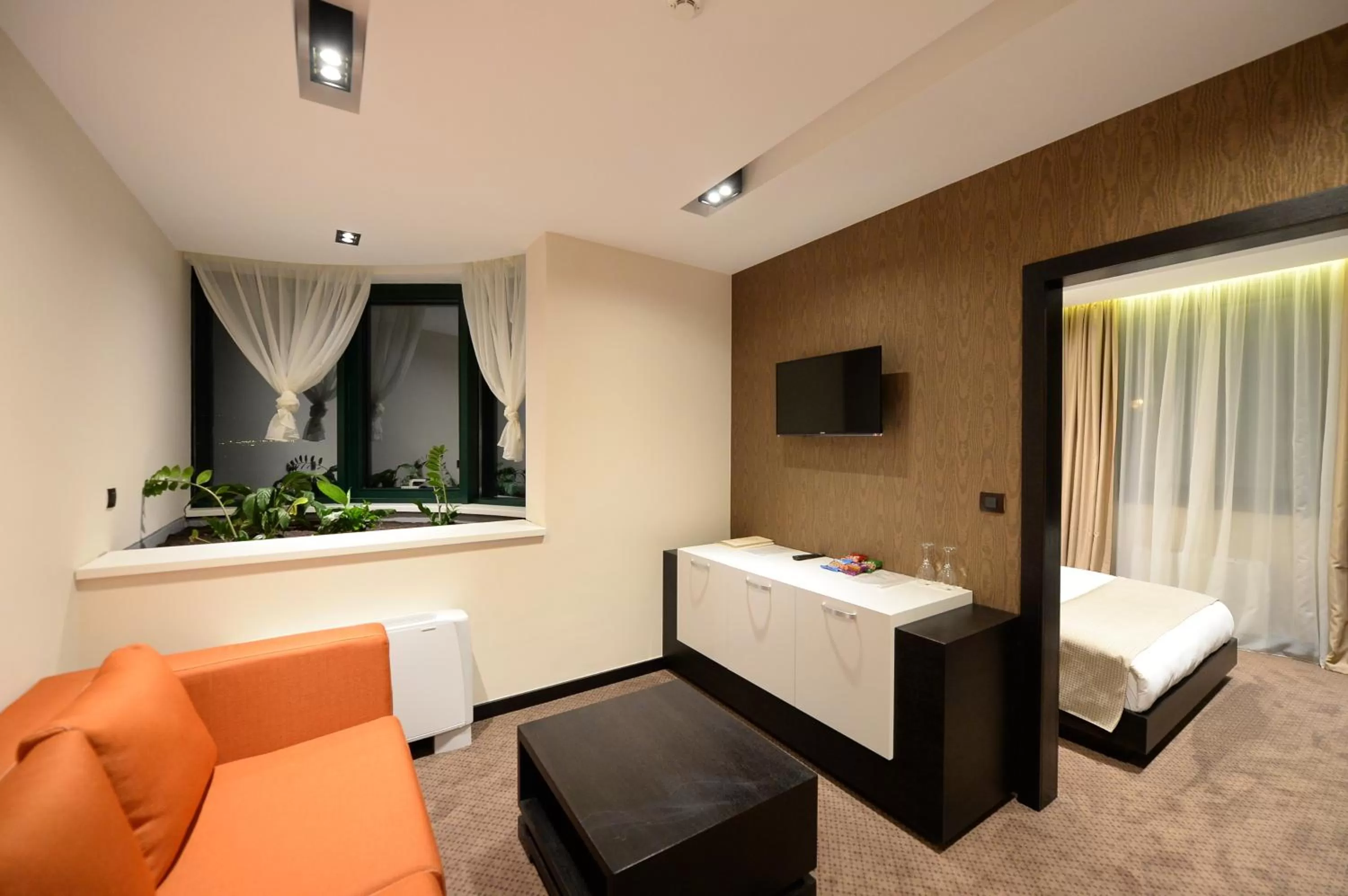 Living room, Bed in Hotel Hedonic