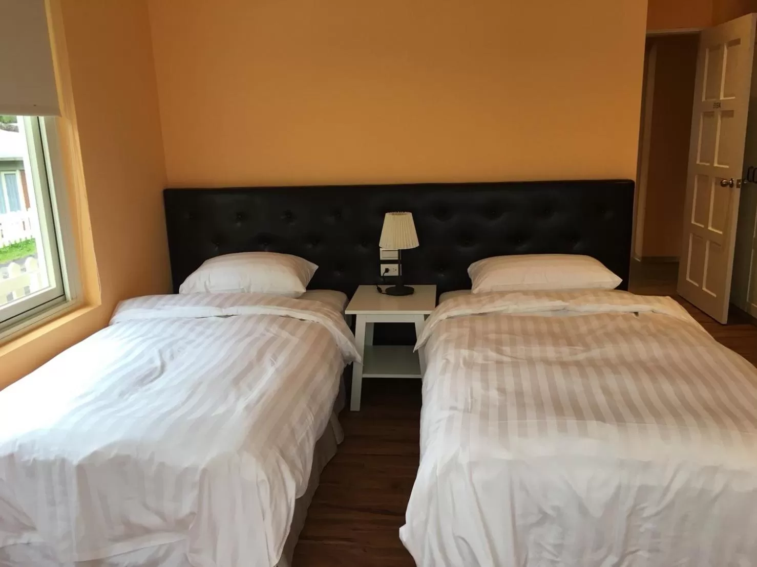 Bed in American Village Resort