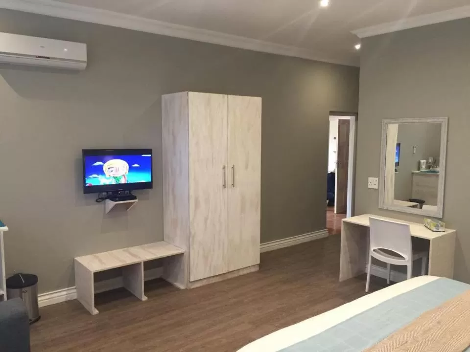 TV and multimedia, TV/Entertainment Center in Imbali Boutique Hotel