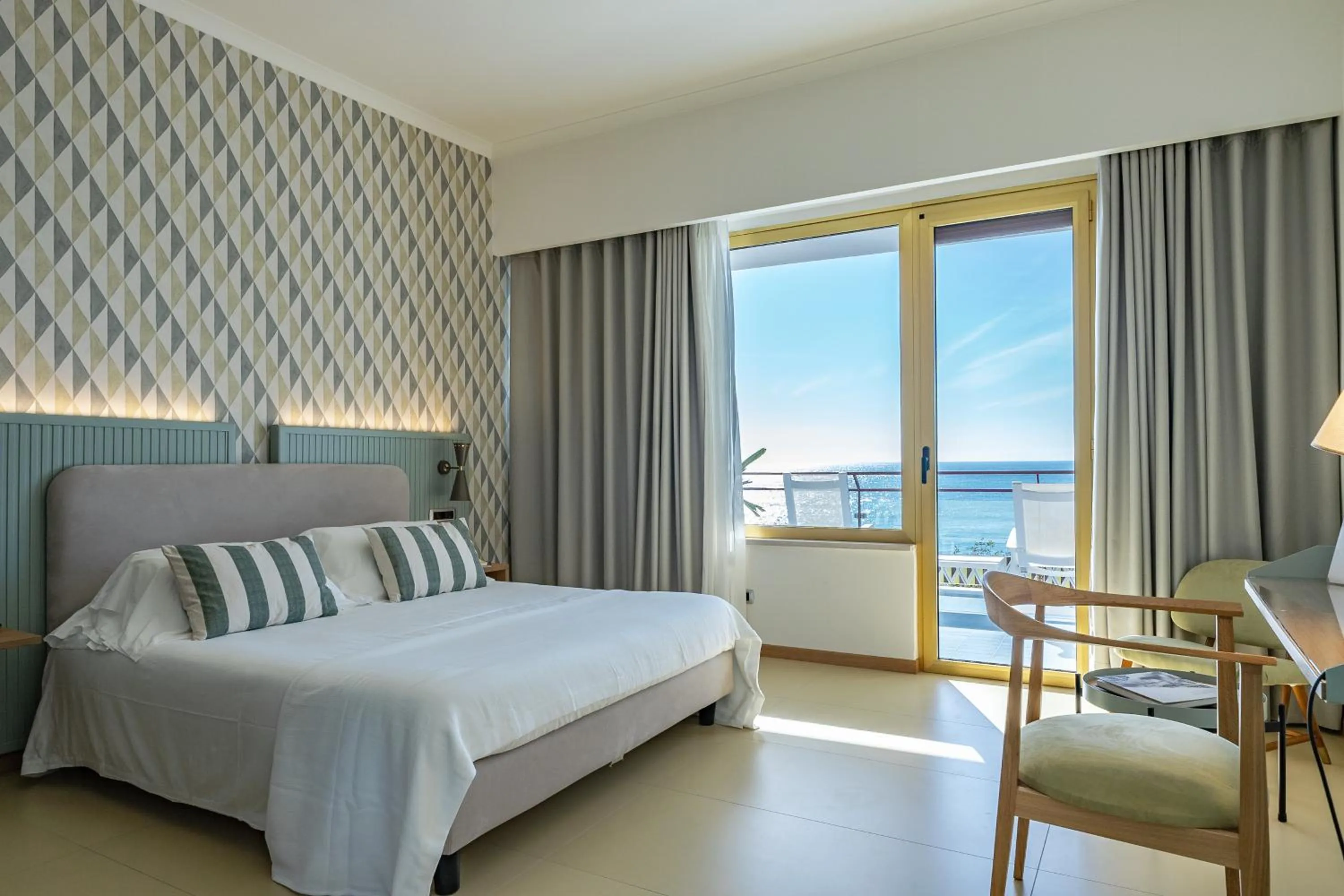 Bed in Reginna Palace Hotel