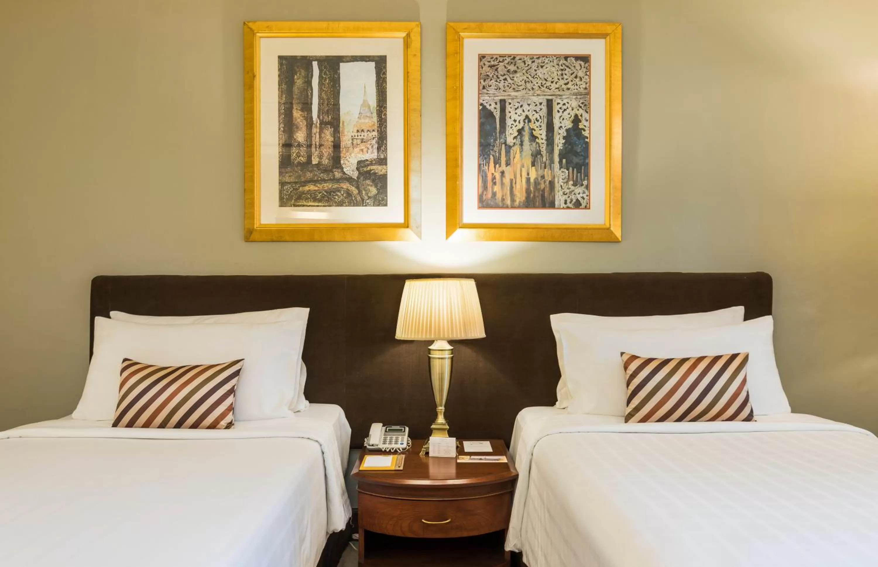 Bed in Chatrium Hotel Royal Lake Yangon