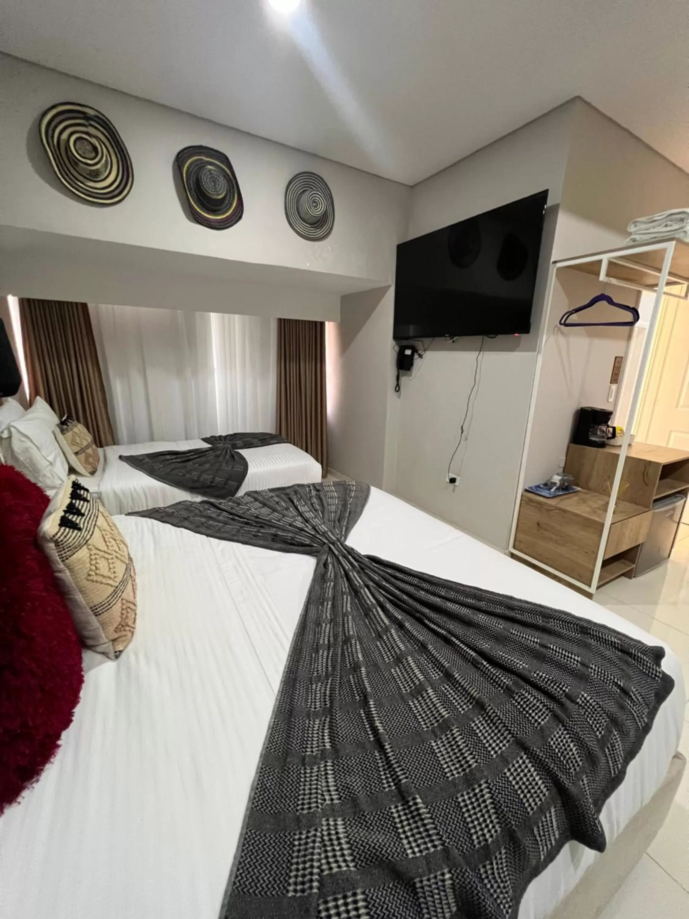 Communal lounge/ TV room, Bed in Hotel Boutique CASA CHUNUU Santa Marta