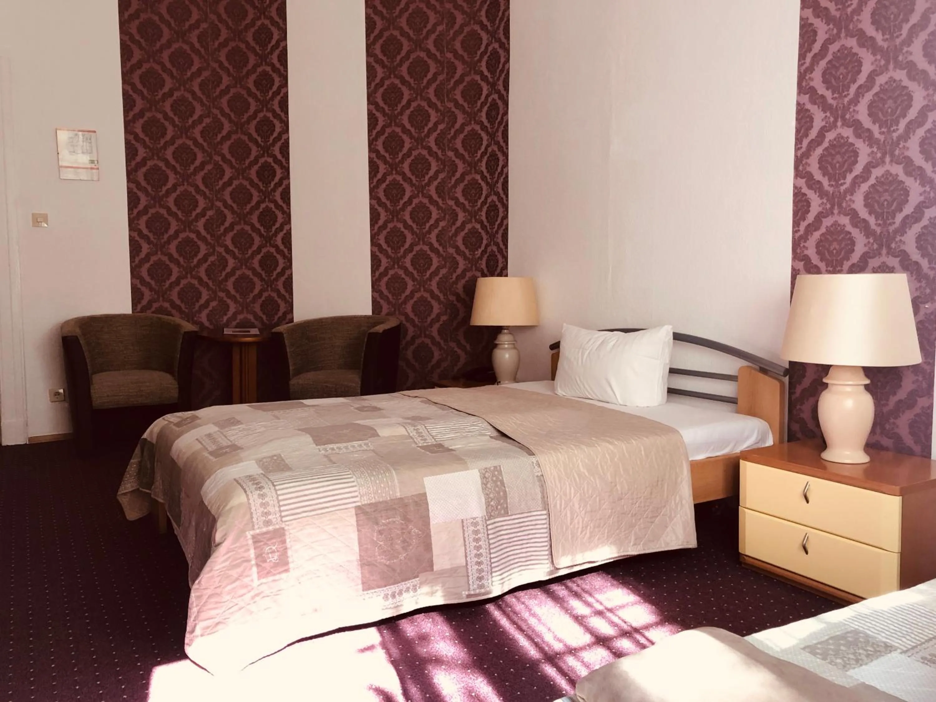 Bed in Hotel Castell am Kurfürstendamm