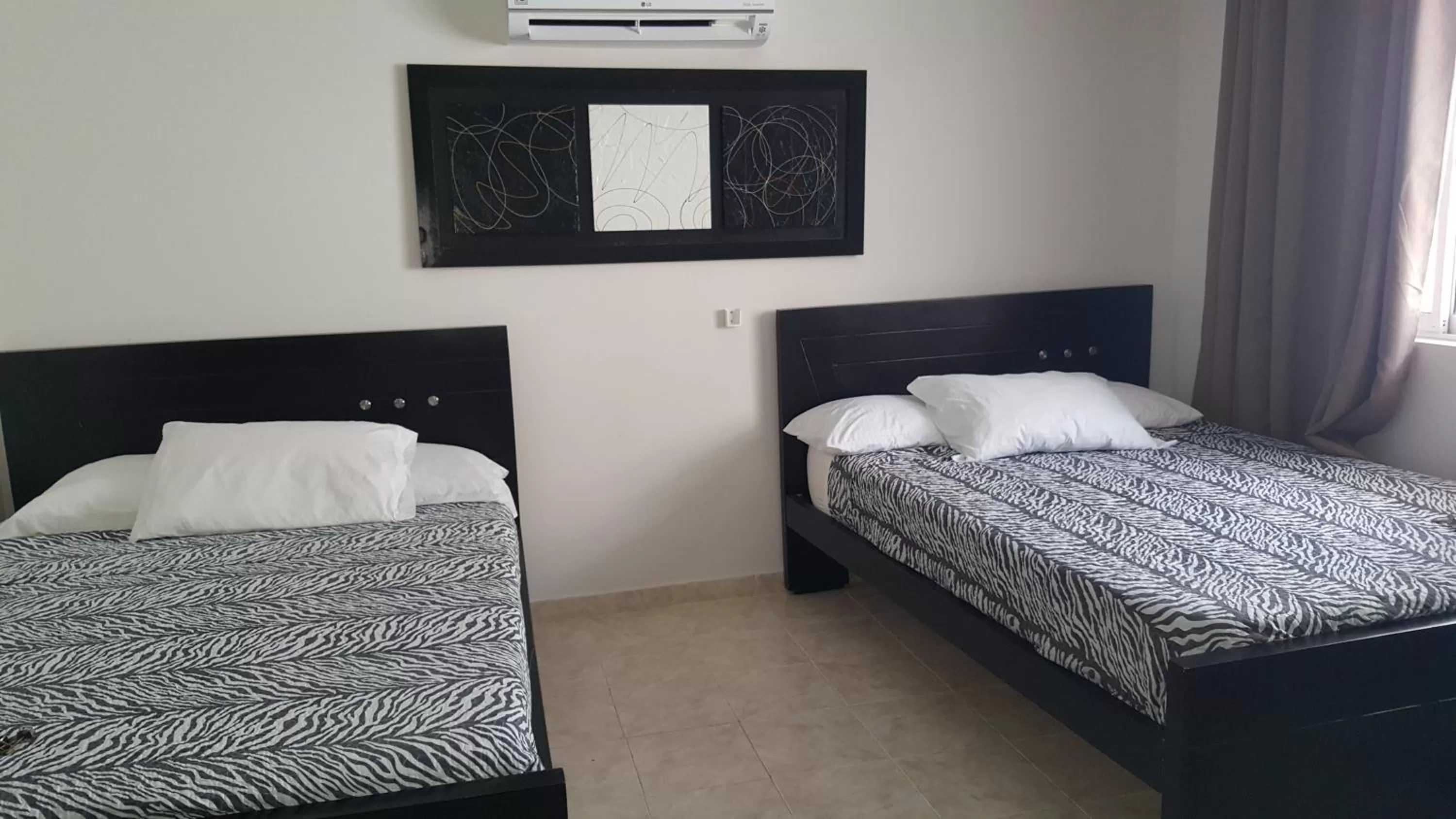 Bed in Caribbean Island Hotel Piso 2