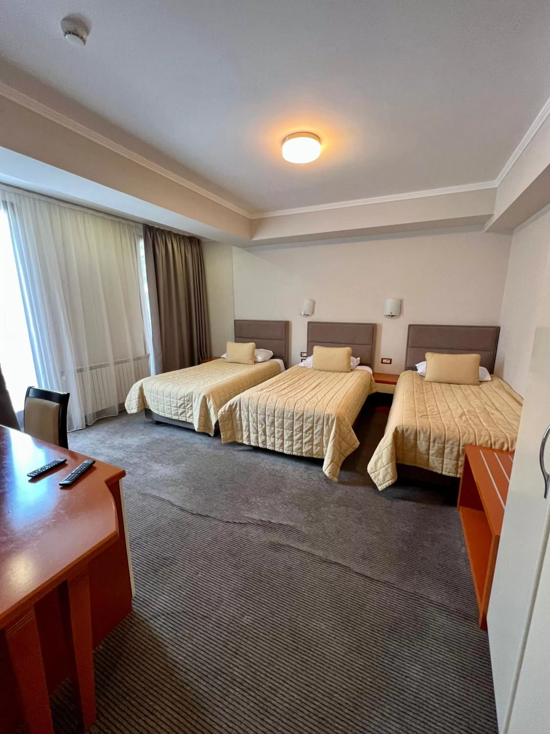 Bed in Hotel Millennium