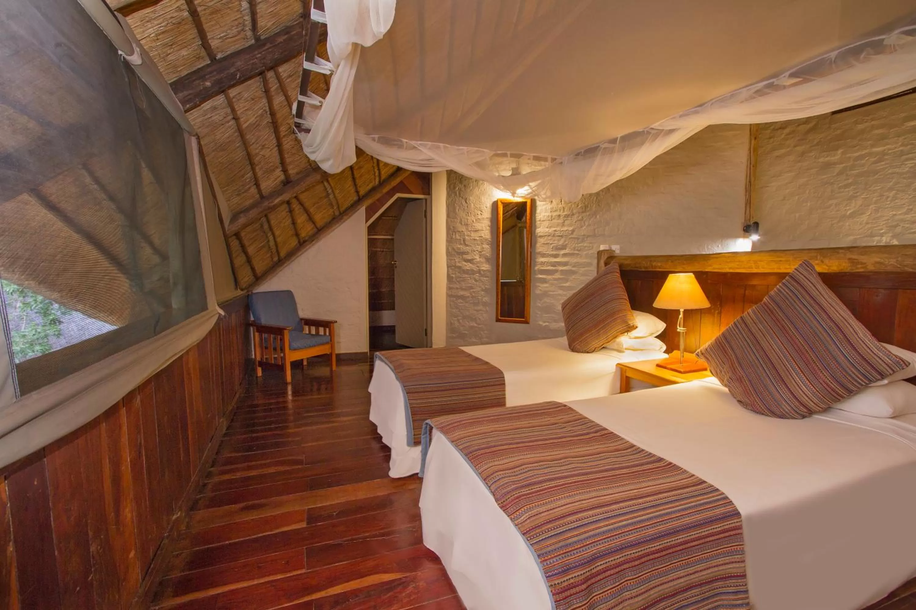 Bed in Lokuthula Lodges