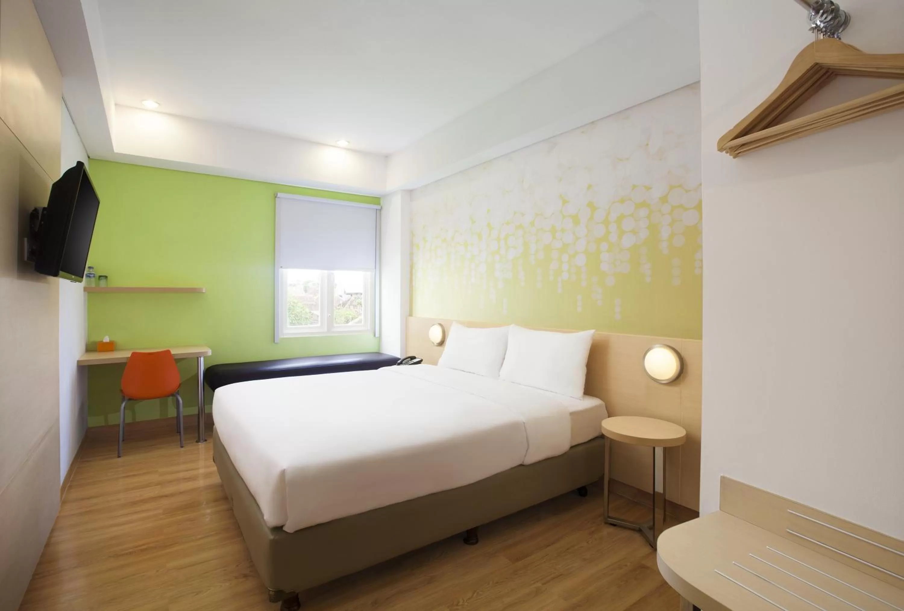 Bed in Zest Yogyakarta by Swiss-Belhotel International