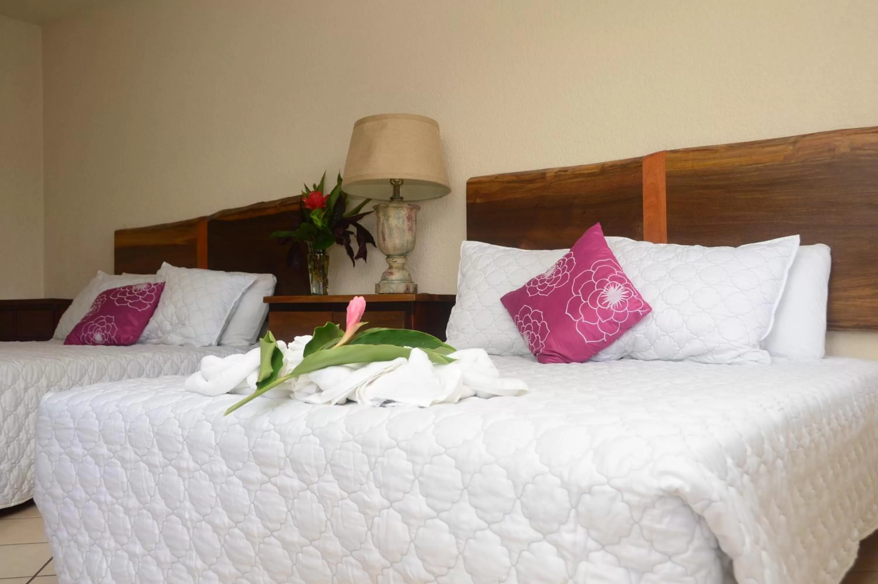 Bed in Lamanai Hotel & Marina