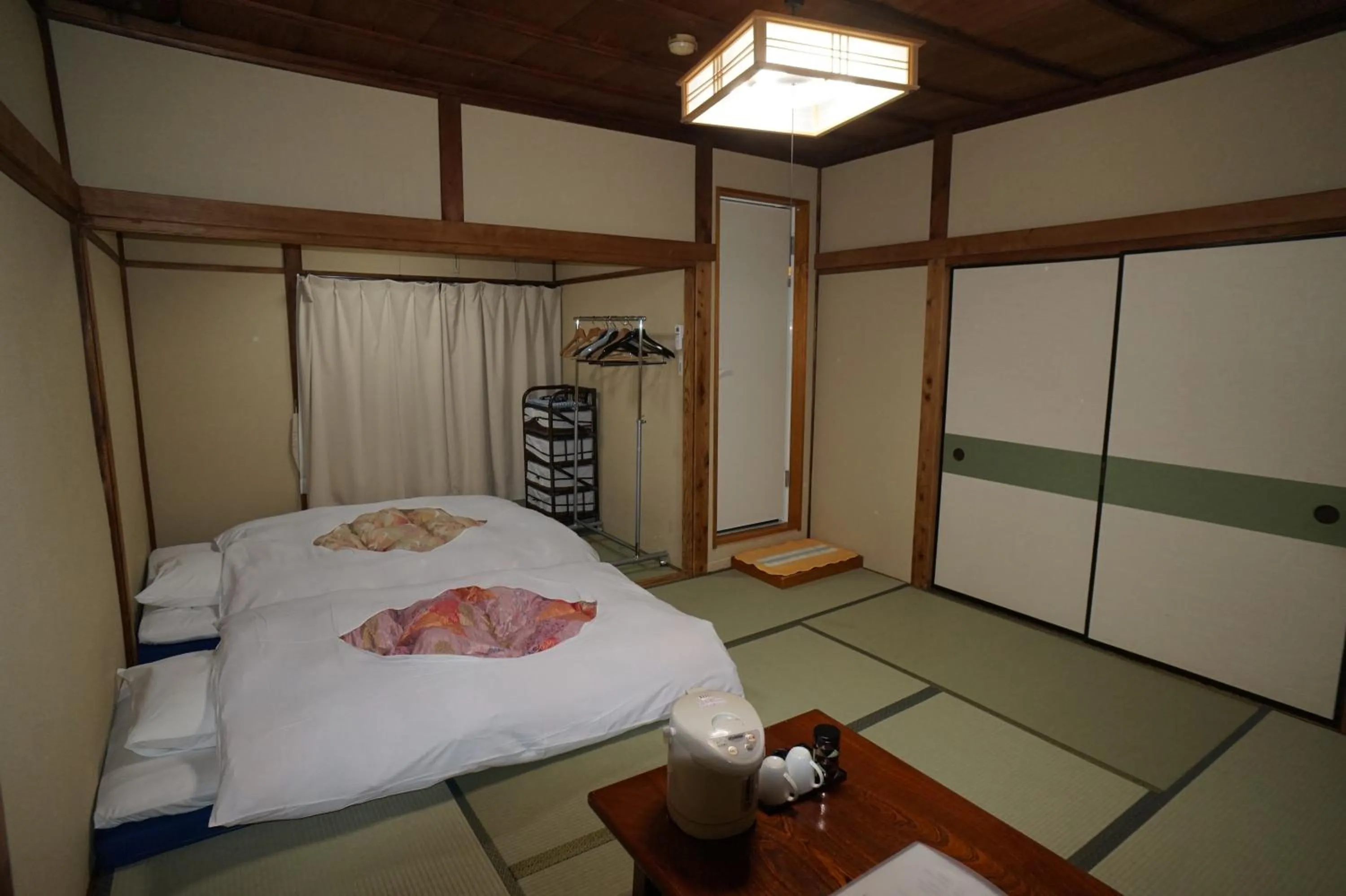 Photo of the whole room, Bed in Ryokan Katsutaro