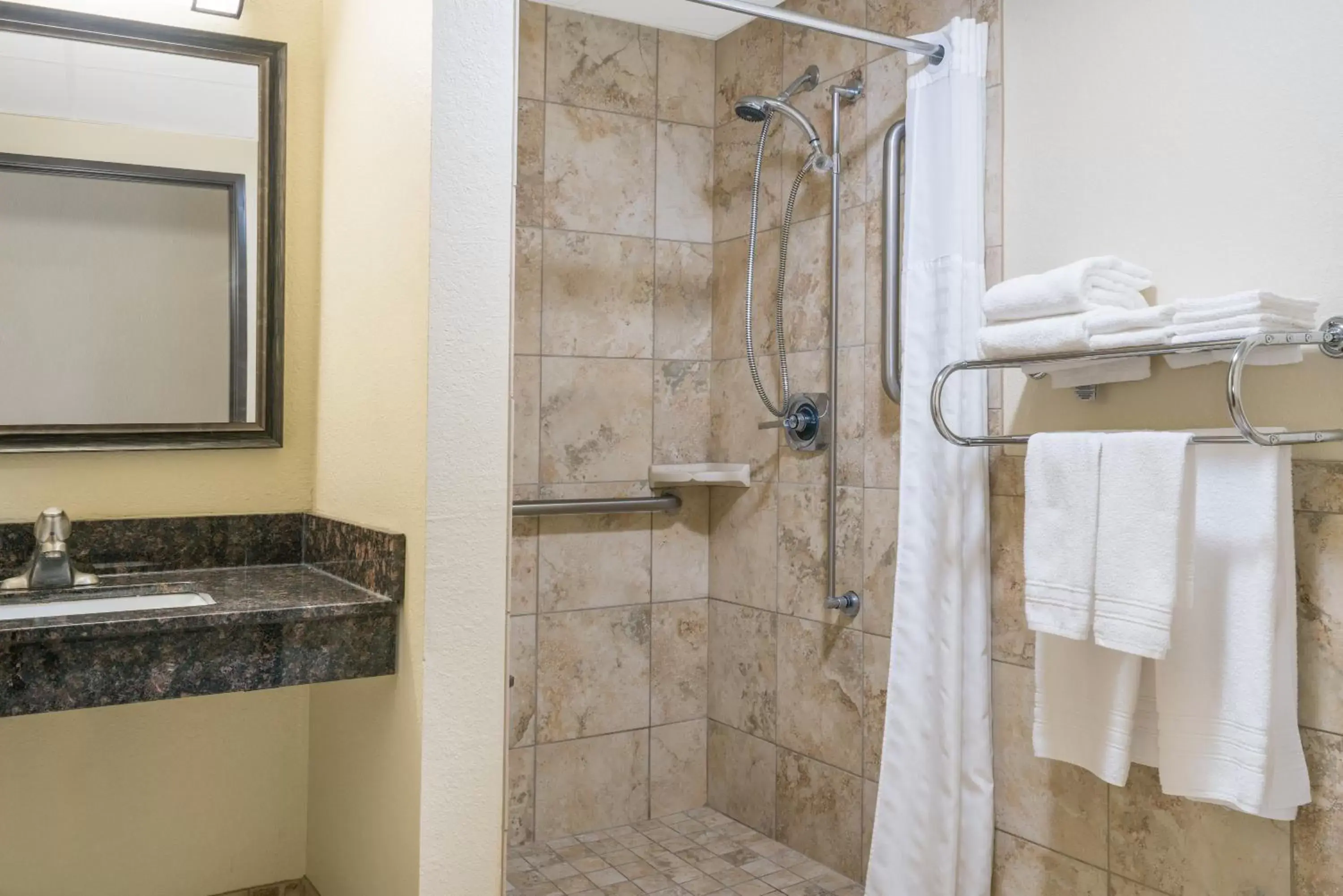 King Room with Roll-in Shower - Mobility Access/Non-Smoking in Days Inn & Suites by Wyndham Baxter Brainerd Area King Room with Roll-in Shower - Mobility Access/Non-Smoking in Days Inn & Suites by Wyndham Baxter Brainerd Area