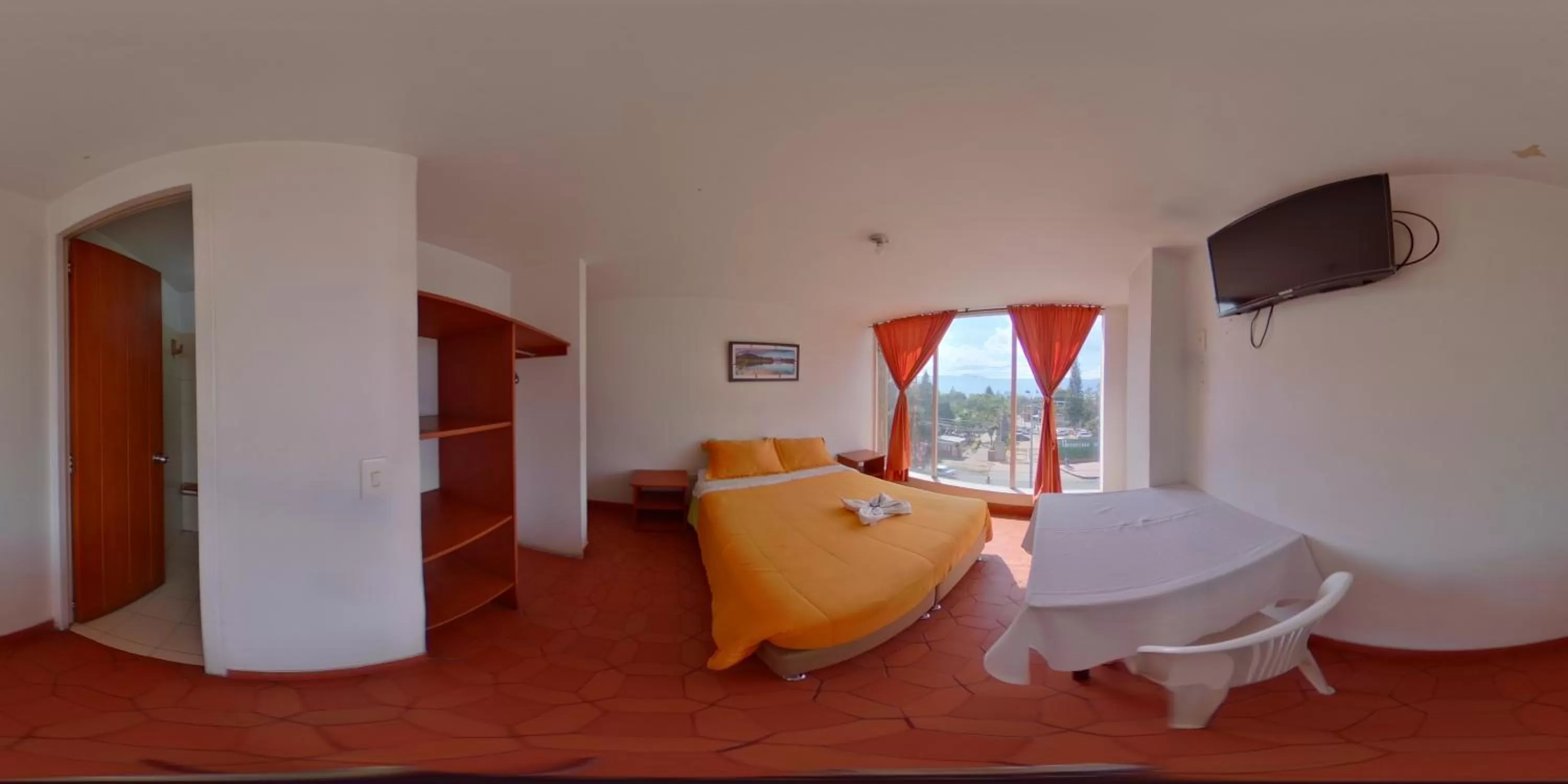 TV/Entertainment Center in Hotel Mónaco de Fusa