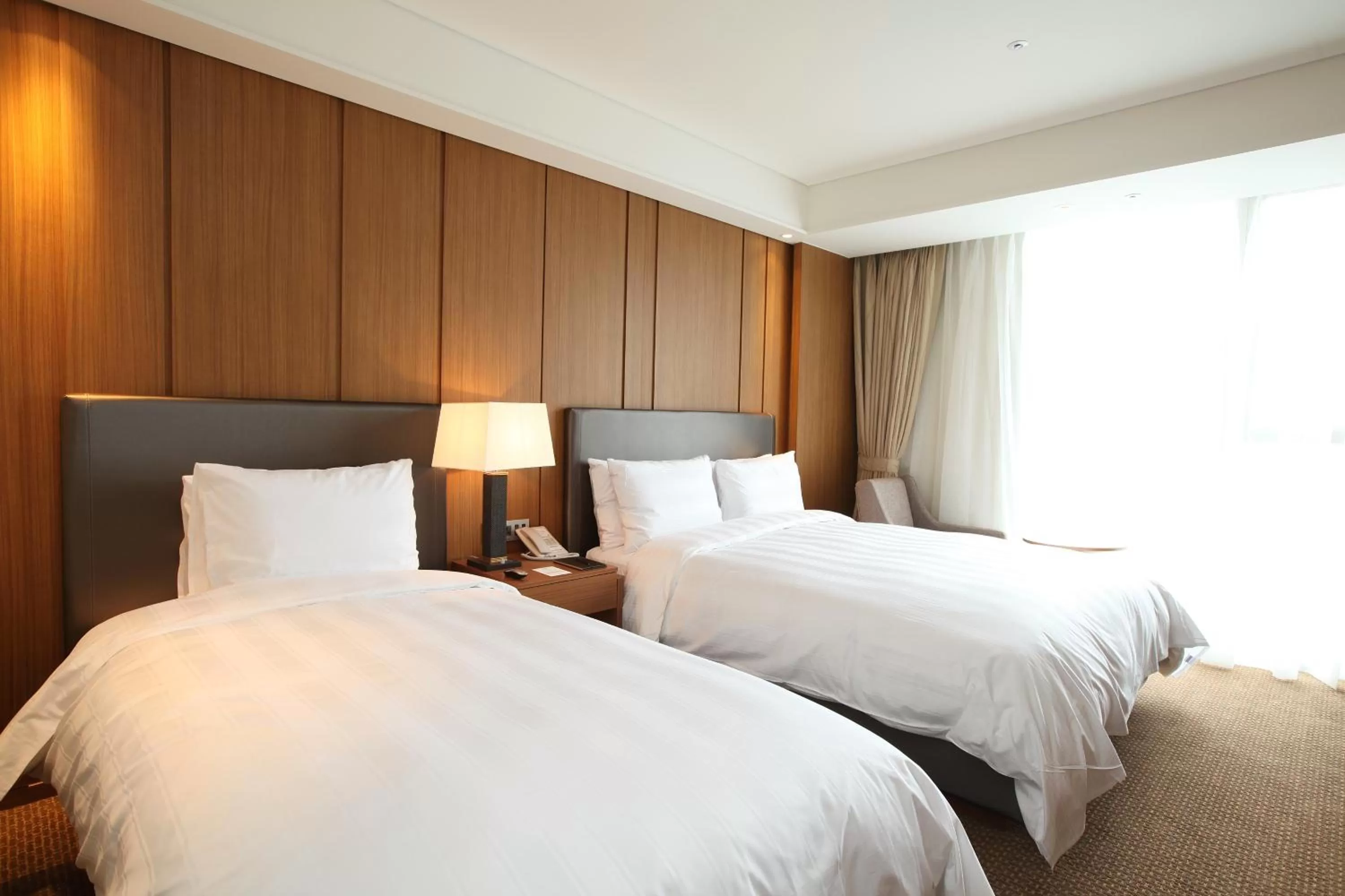 Bed in LOTTE CITY HOTEL Daejeon