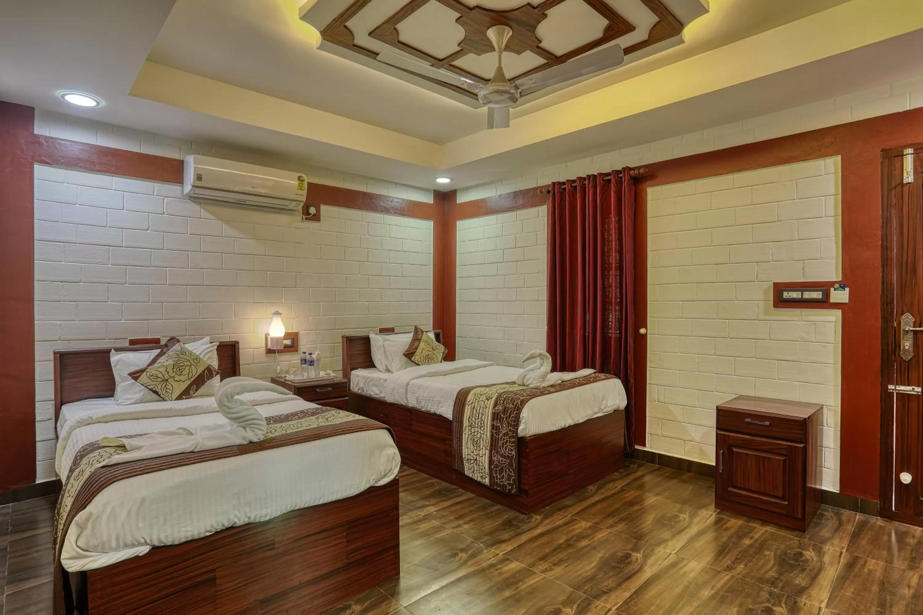 Bed in LEISURE VALLEY BEACH RESORT