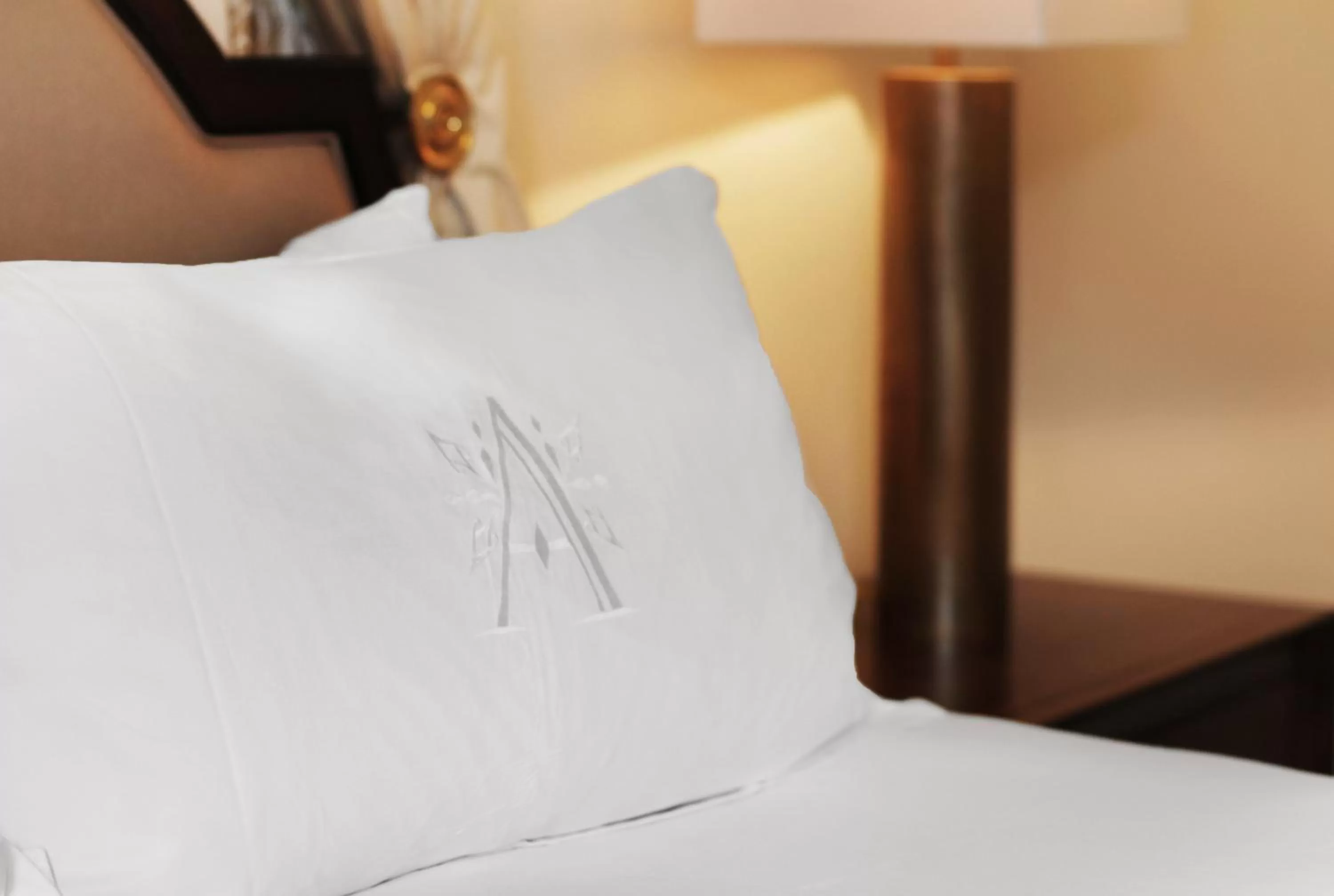 Bed in The Arrabelle at Vail Square, a RockResort, by Vail Resorts