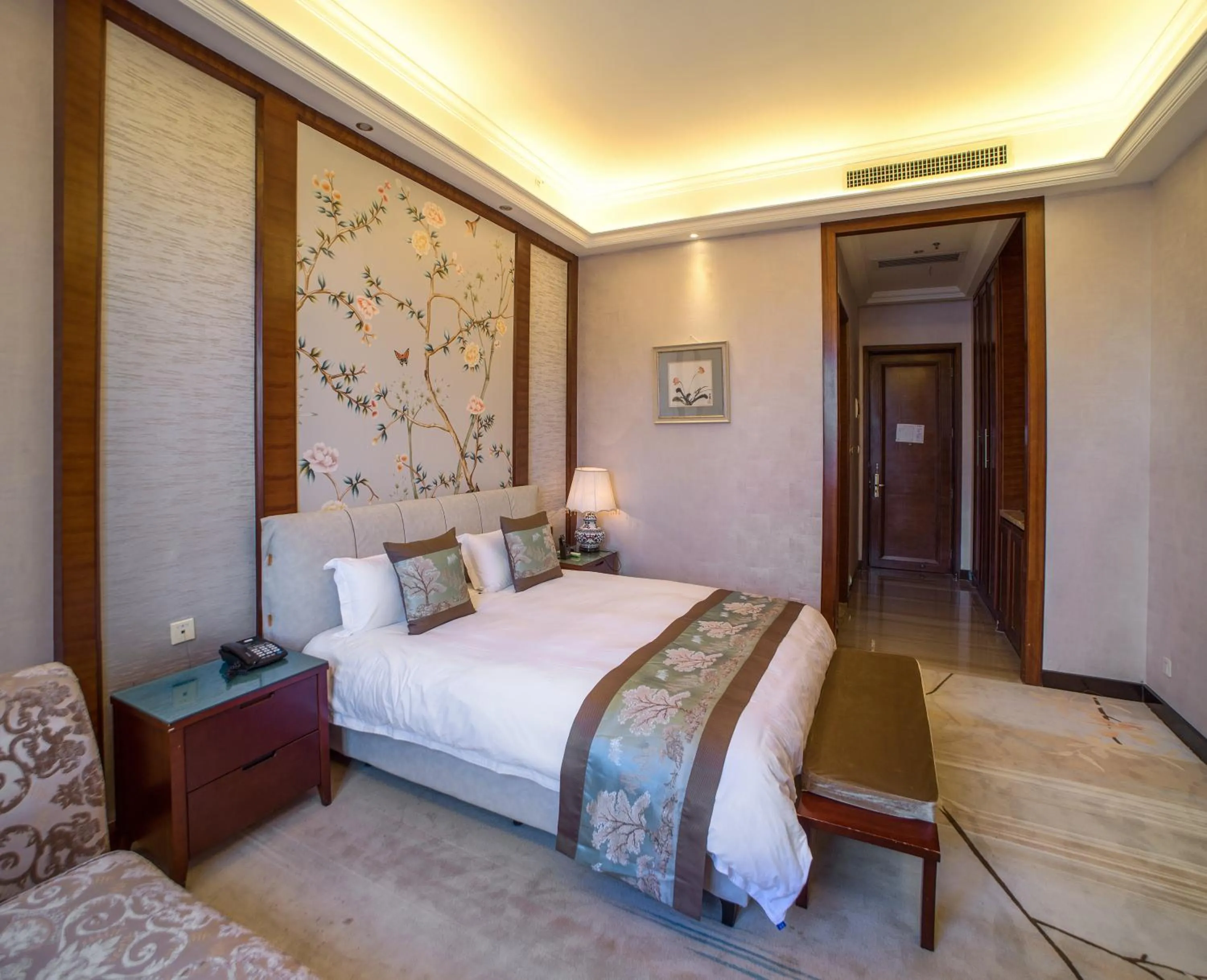 Bedroom in Guangzhou Nuomo International Hotel-Canton Fair Free Shuttle Bus