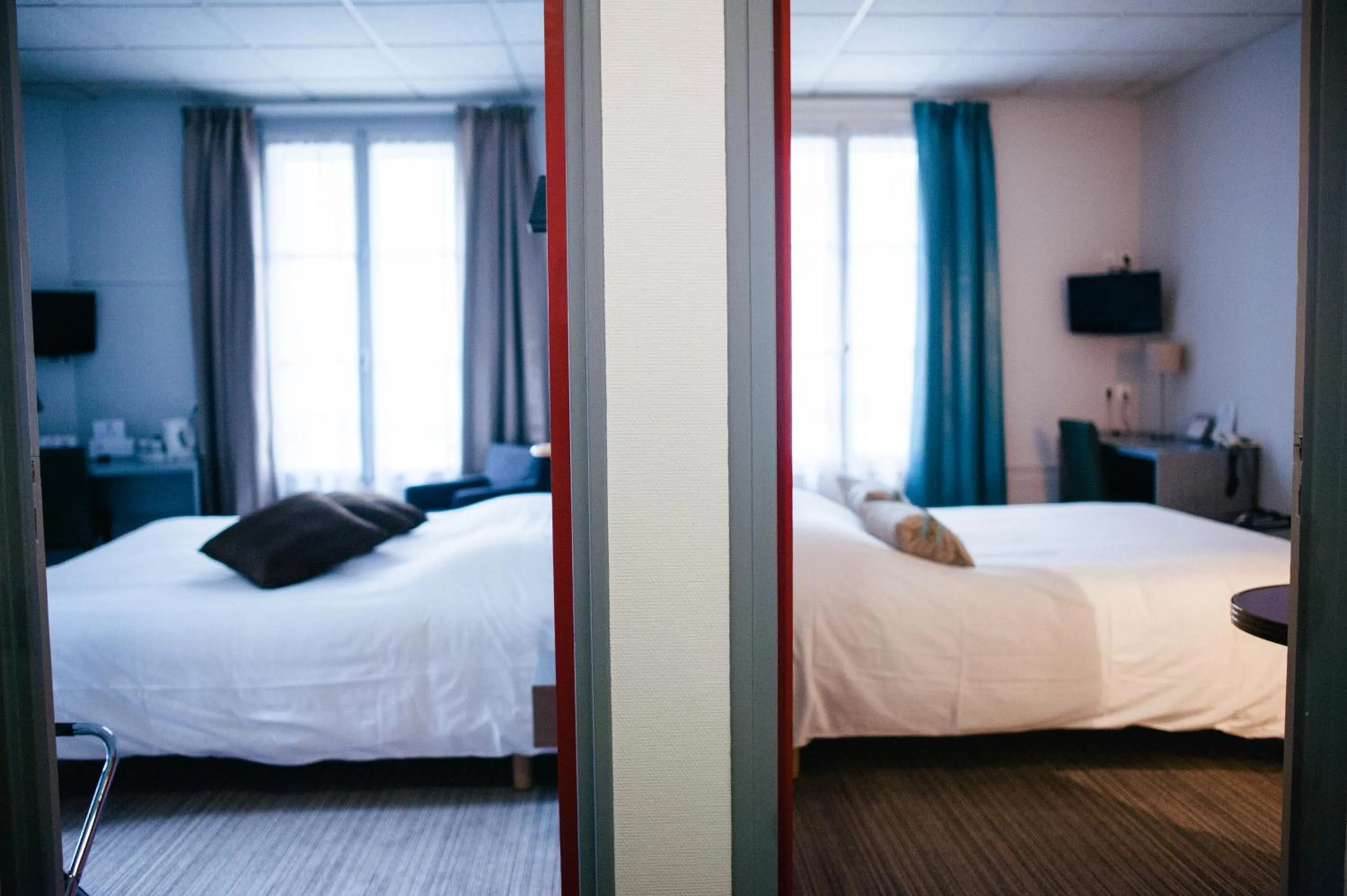 Photo of the whole room, Bed in Hôtel Carmin