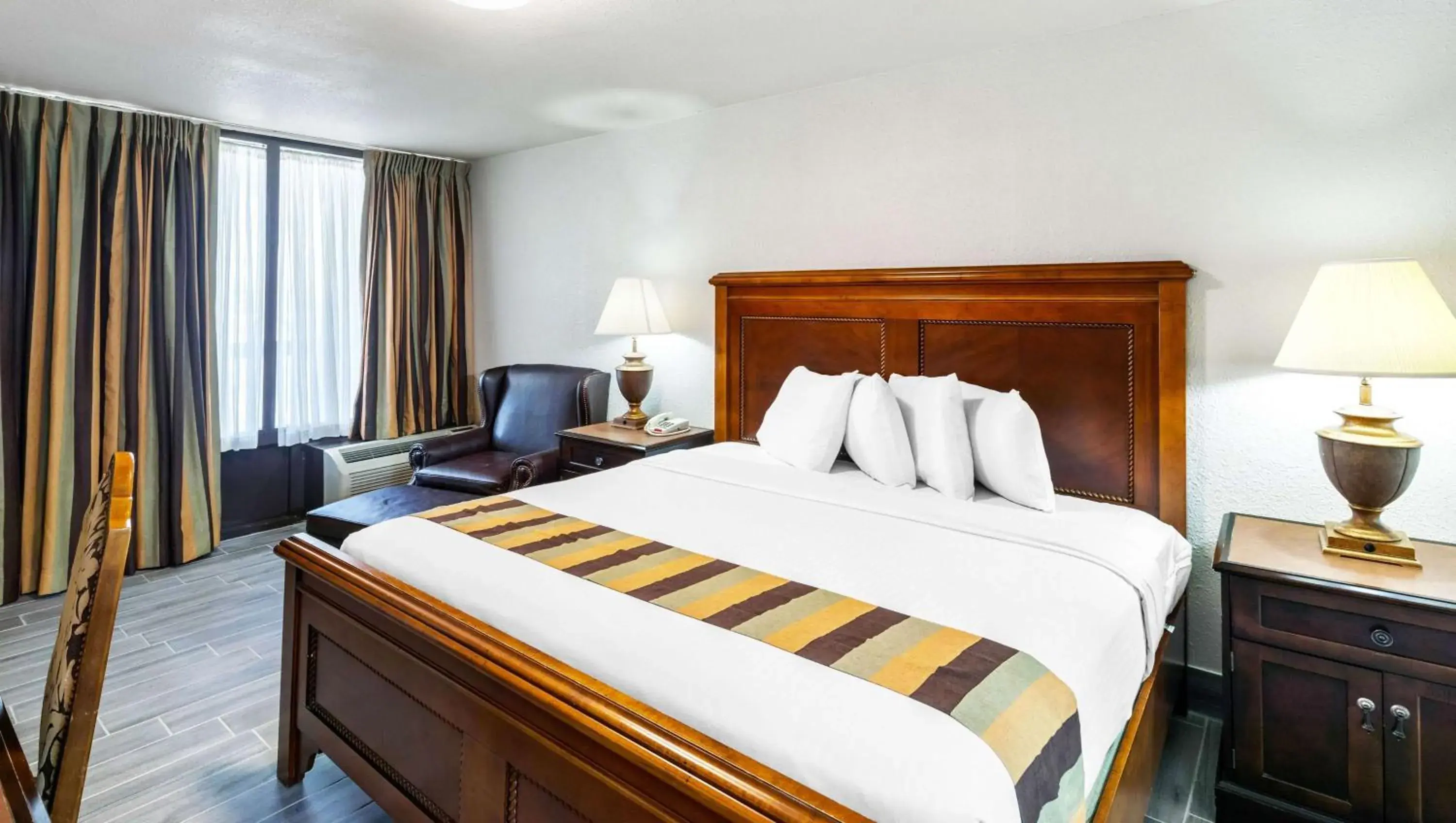 1 Queen Bed Nonsmoking in Magnuson Grand Hotel and Conference Center Tyler 1 Queen Bed Nonsmoking in Magnuson Grand Hotel and Conference Center Tyler