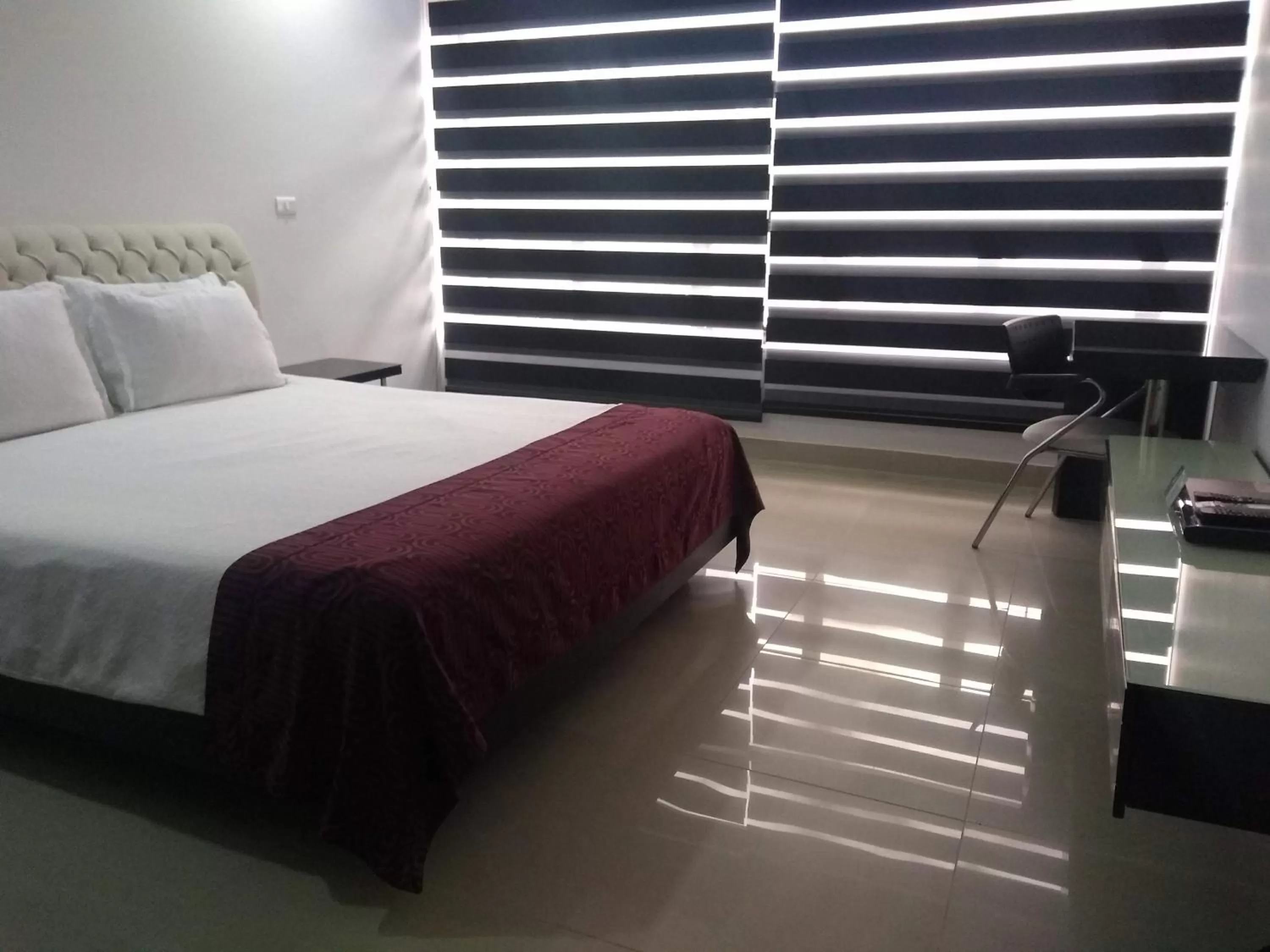 Bed in Hotel Merlott 70