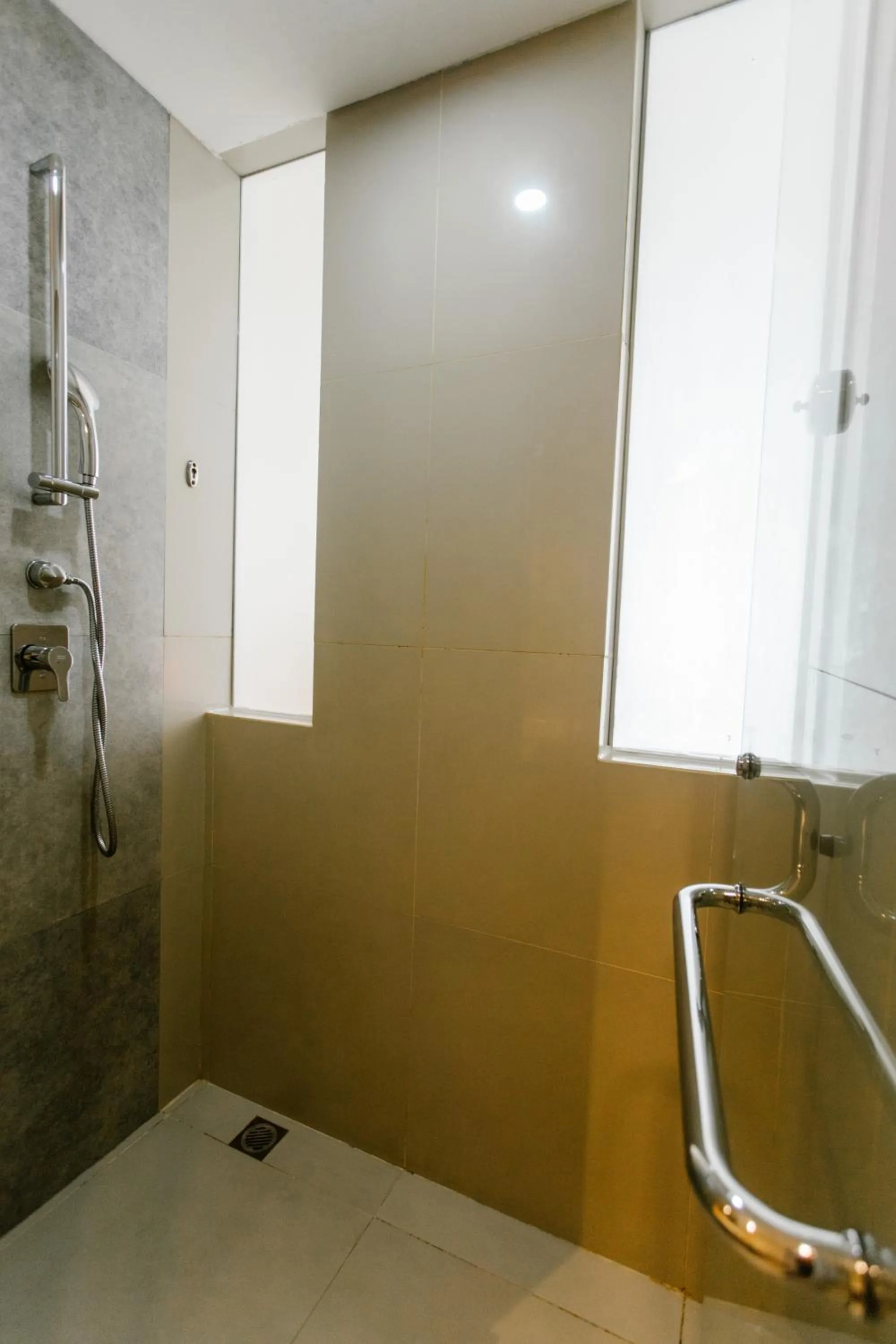 Bathroom in HARRIS Hotel Pontianak