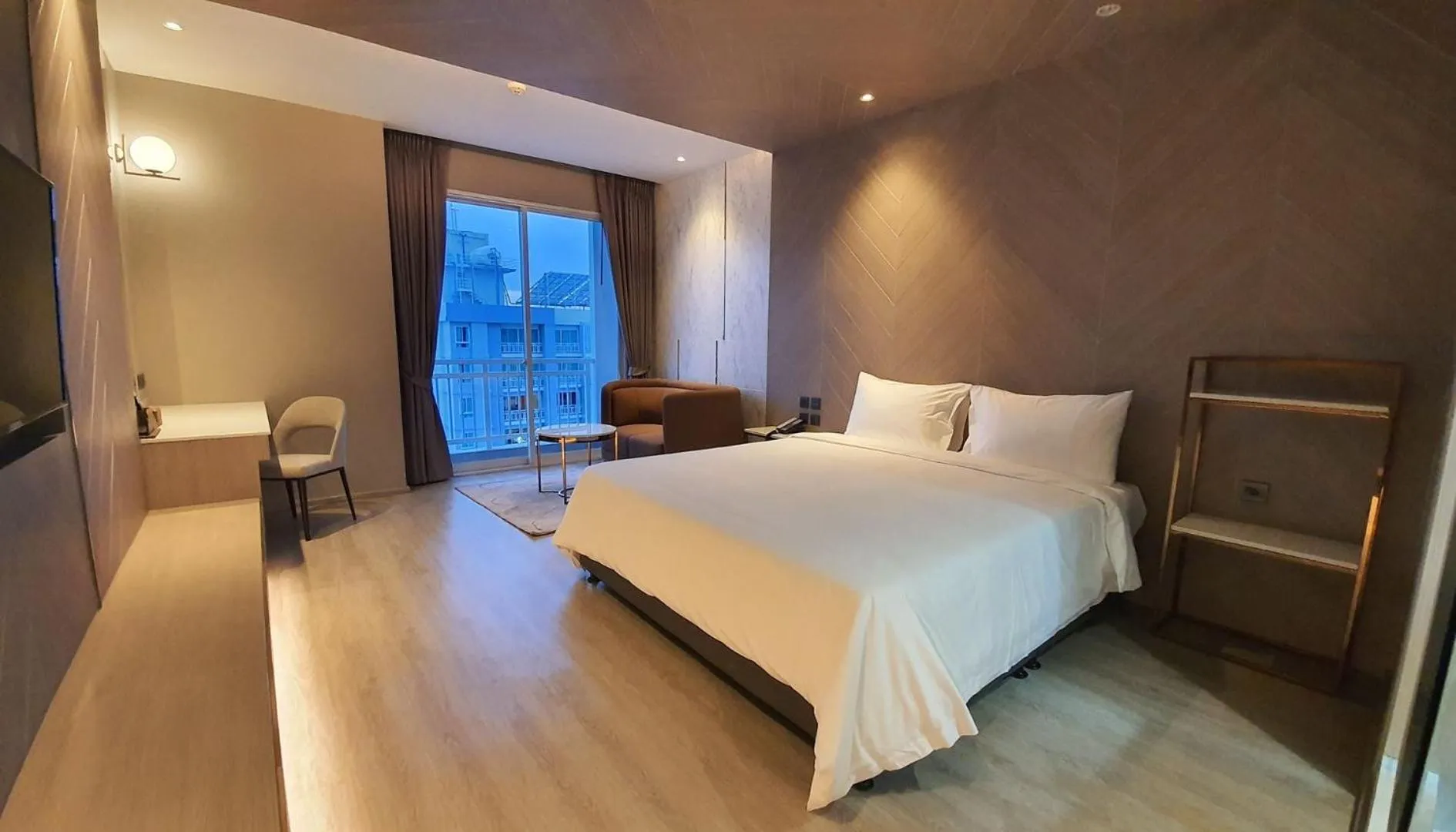 Property building, Bed in Golden City Rayong Hotel