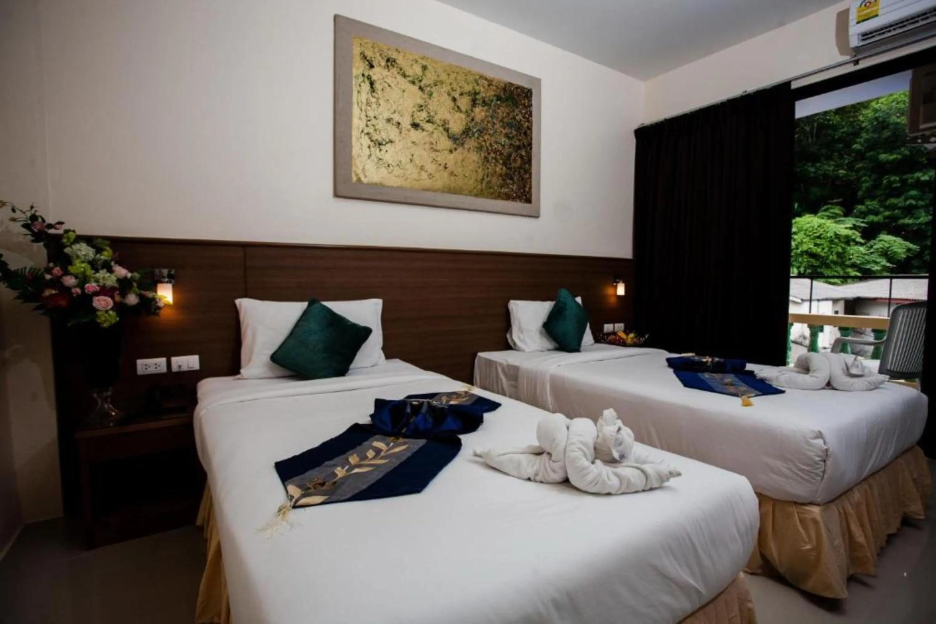 Bedroom in The Wave Hotel Patong SHA