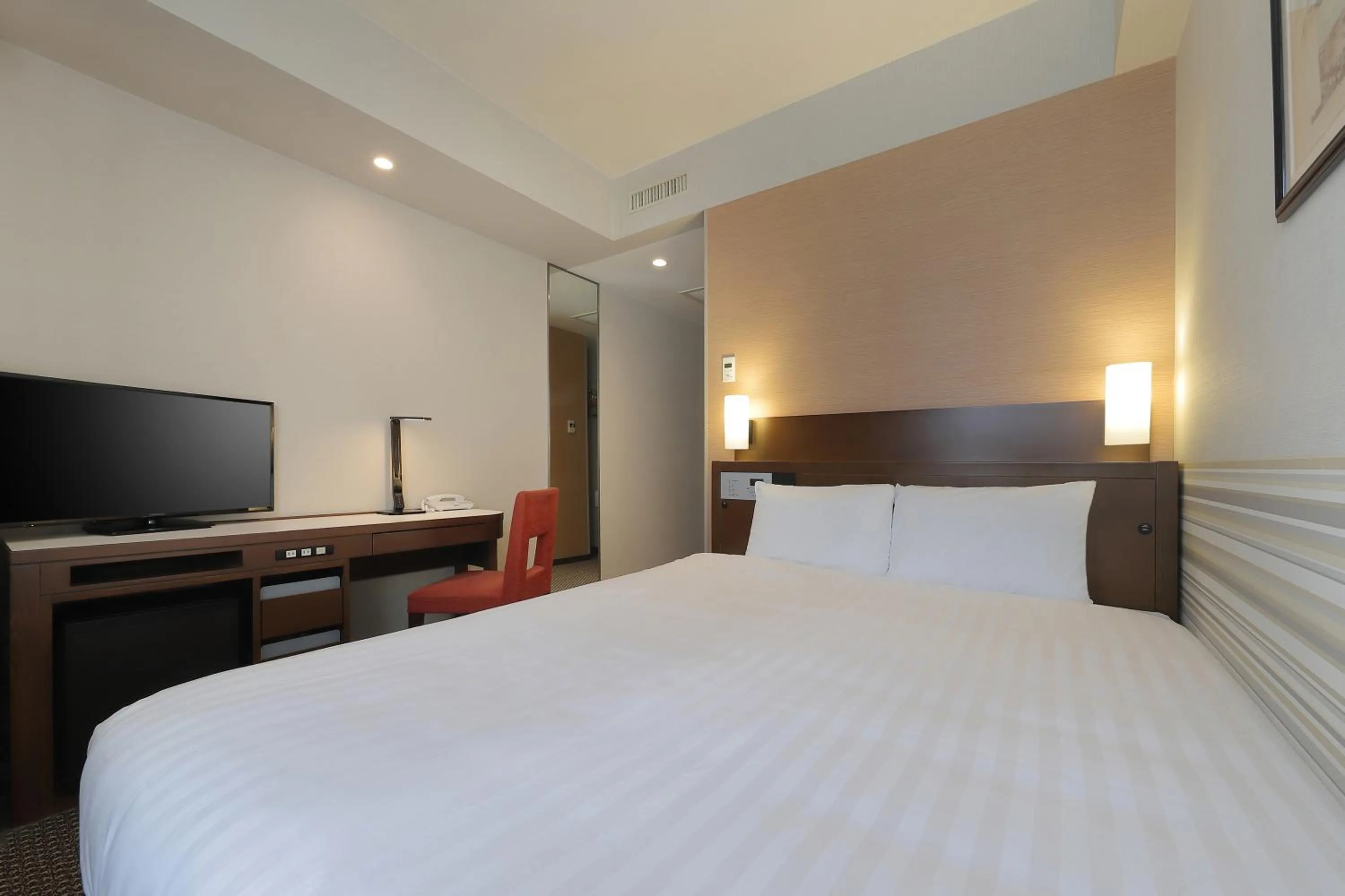 Bed in Keio Presso Inn Shinjuku