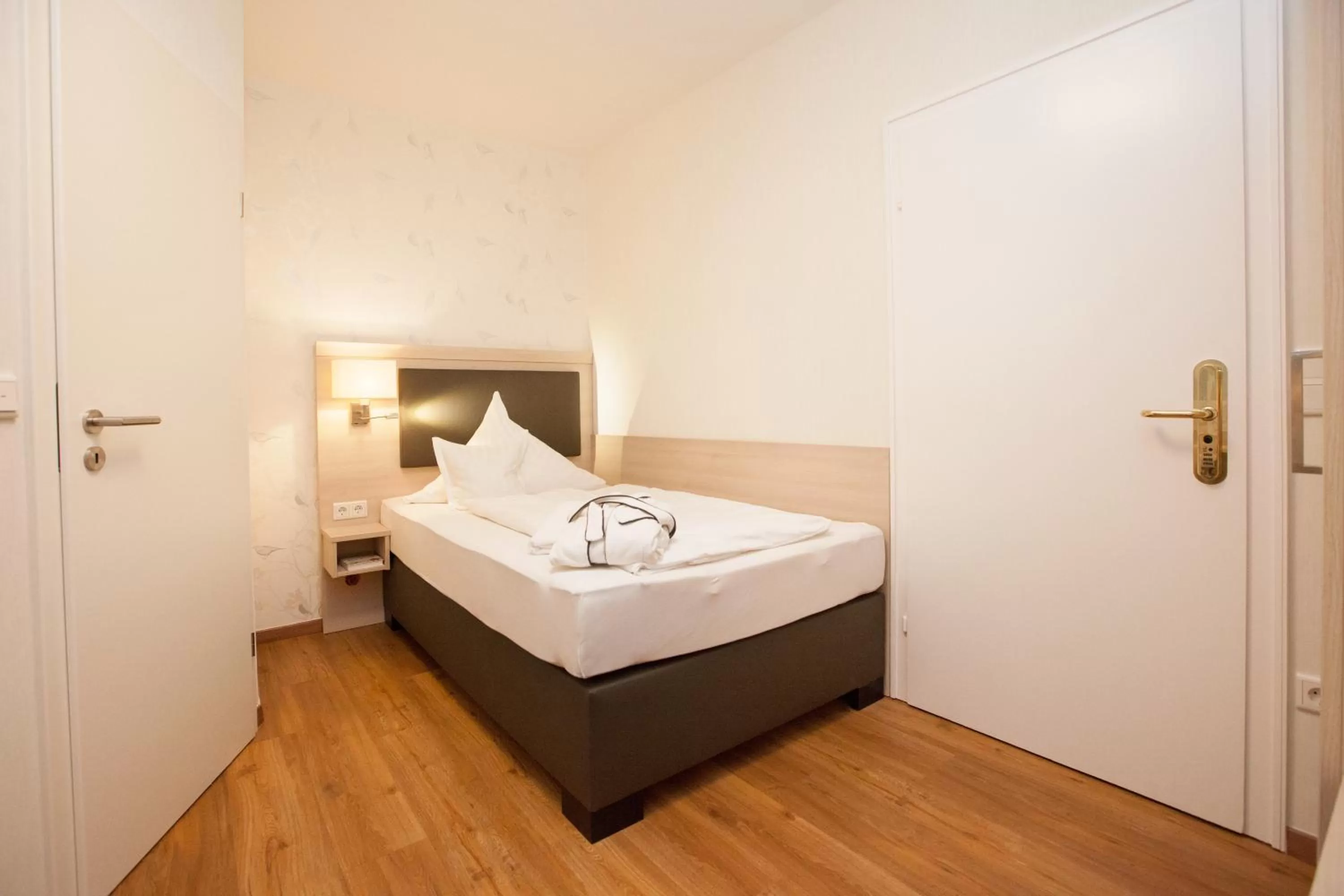 Bed, Room Photo in Ferienhotel Haus Becker